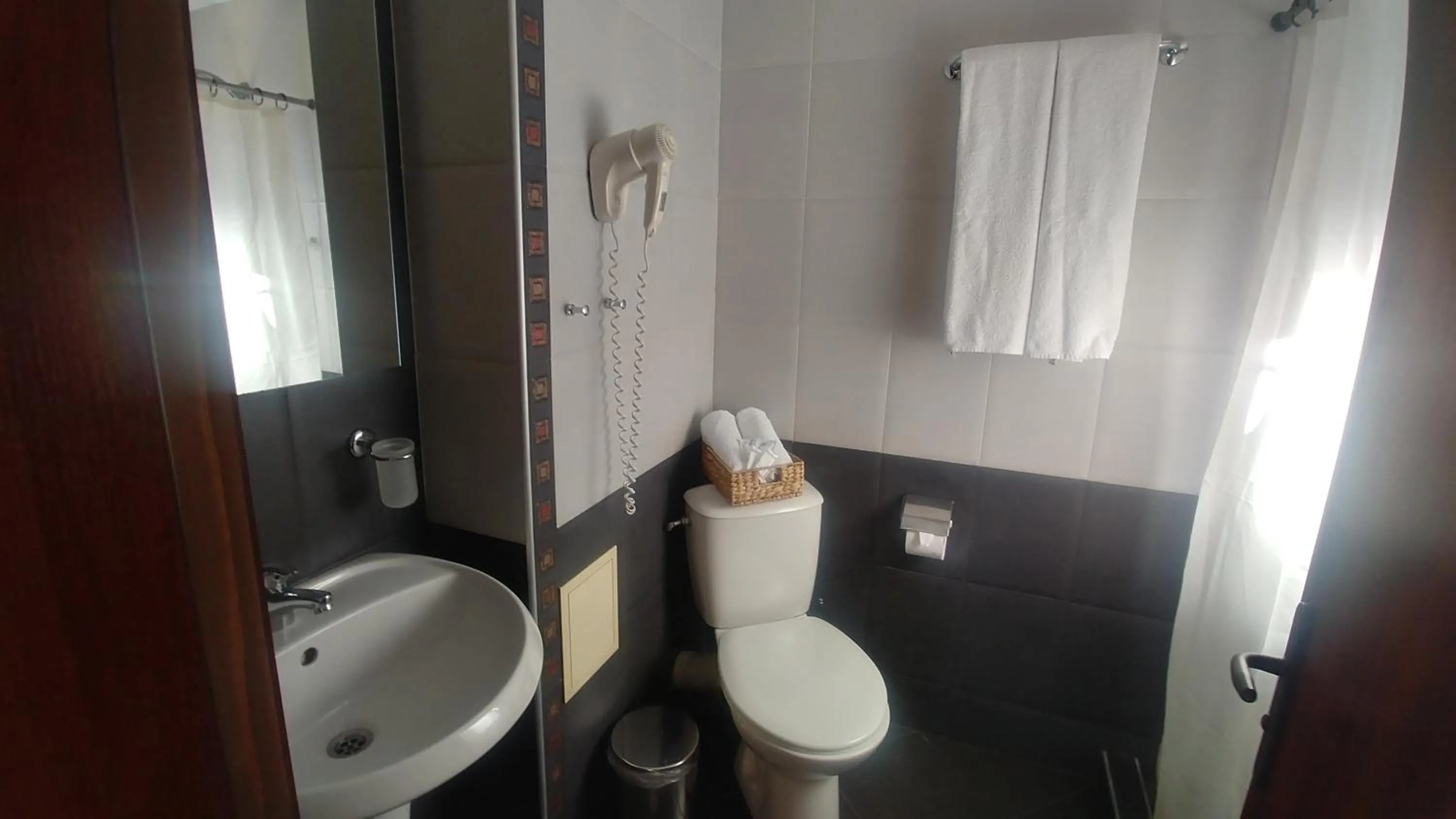 Bathroom in Family Hotel Muses