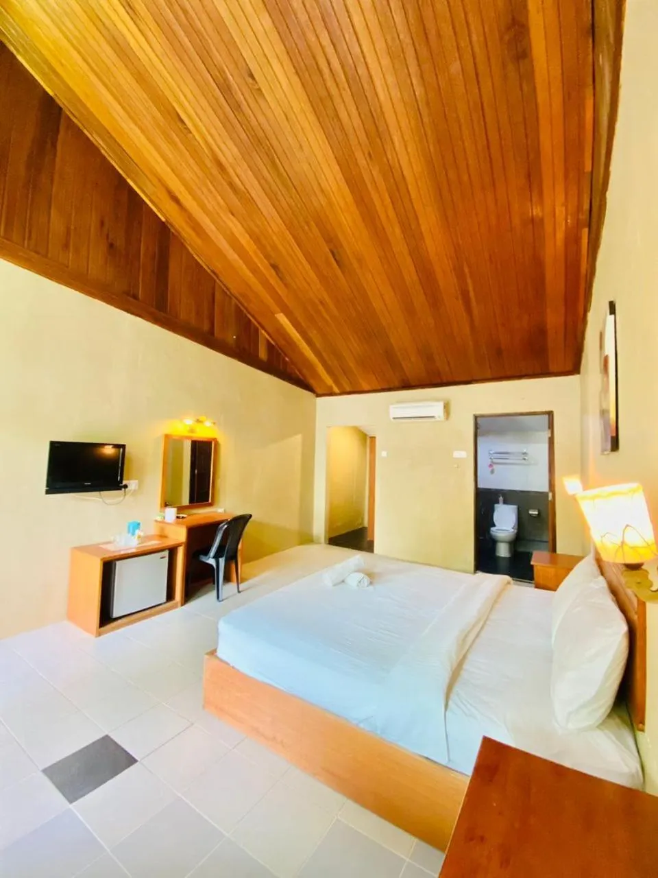 Bed in Landcons Hotel & Resort