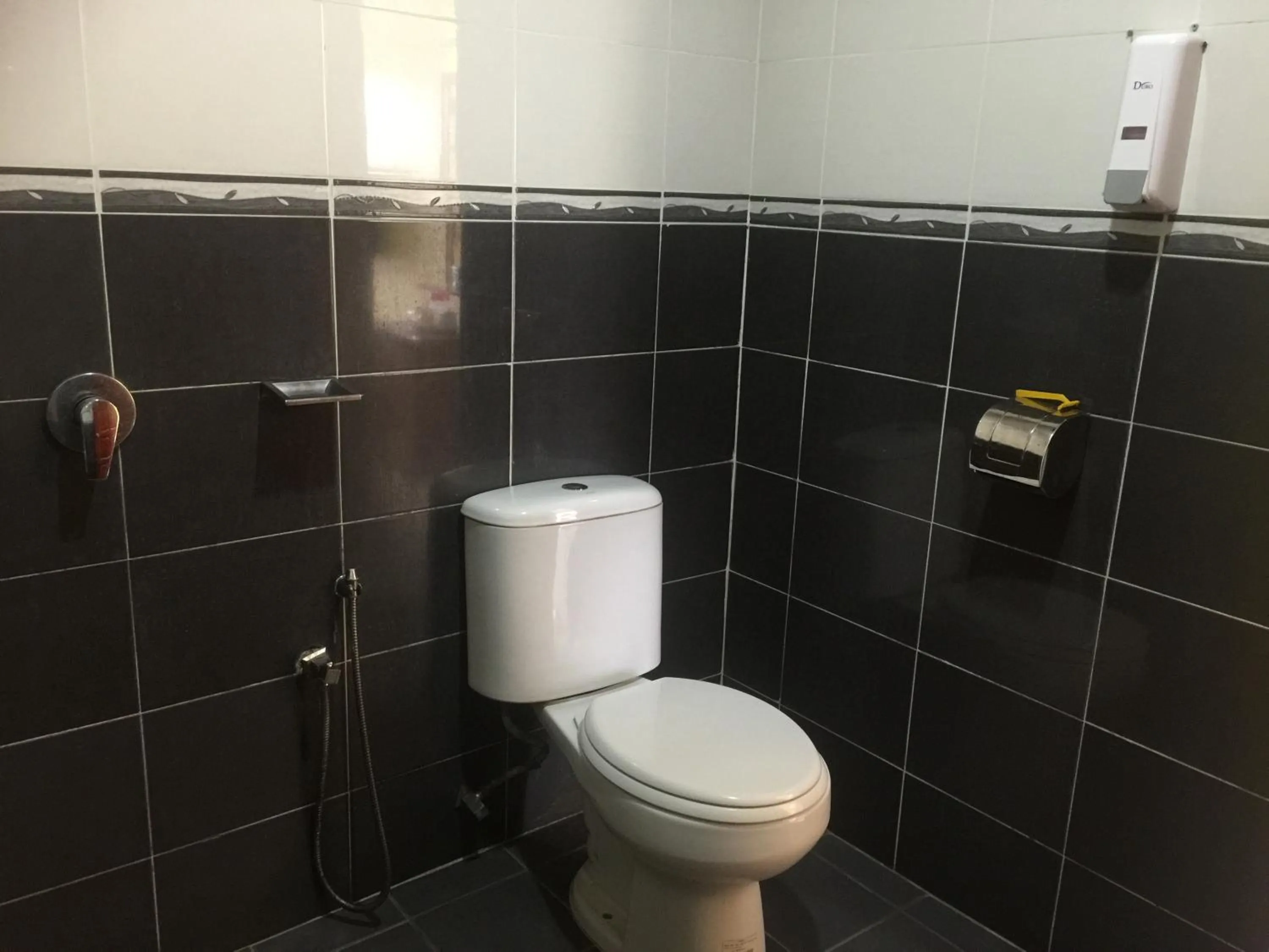 Toilet in Landcons Hotel & Resort