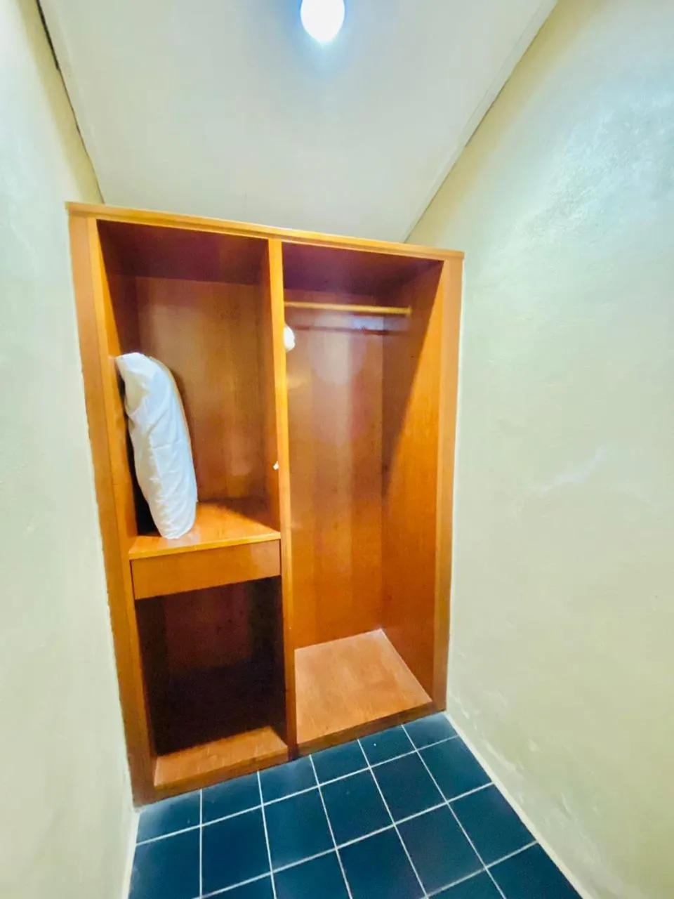 wardrobe in Landcons Hotel & Resort