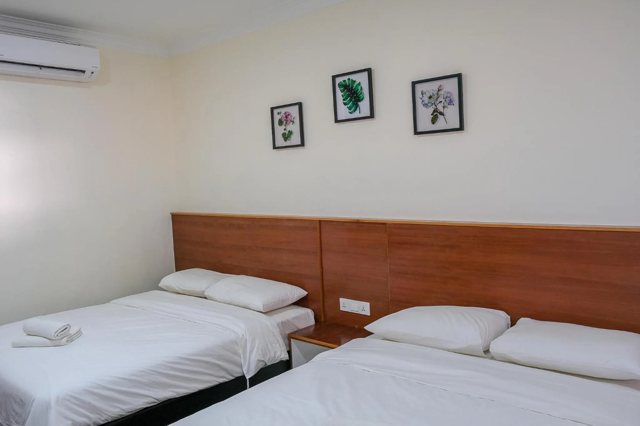 Bed in Landcons Hotel & Resort