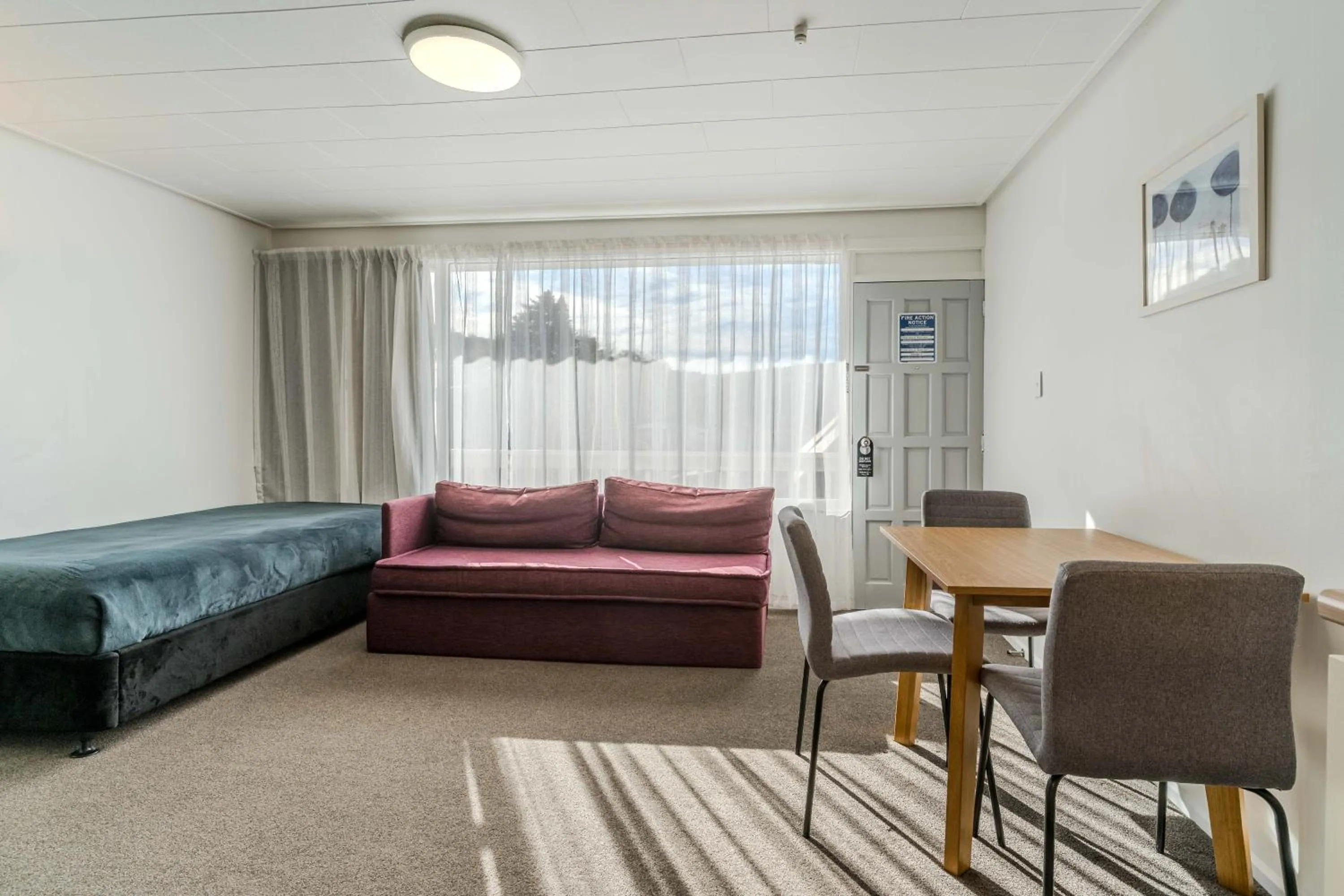 Living room, Bed in George Street Motel Apartments