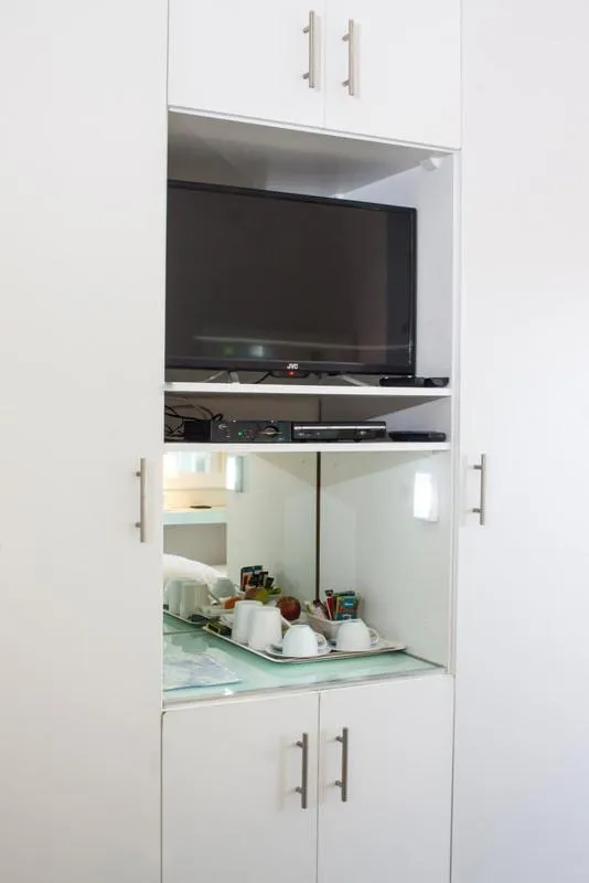 TV and multimedia in South Villa Guesthouse&Garden