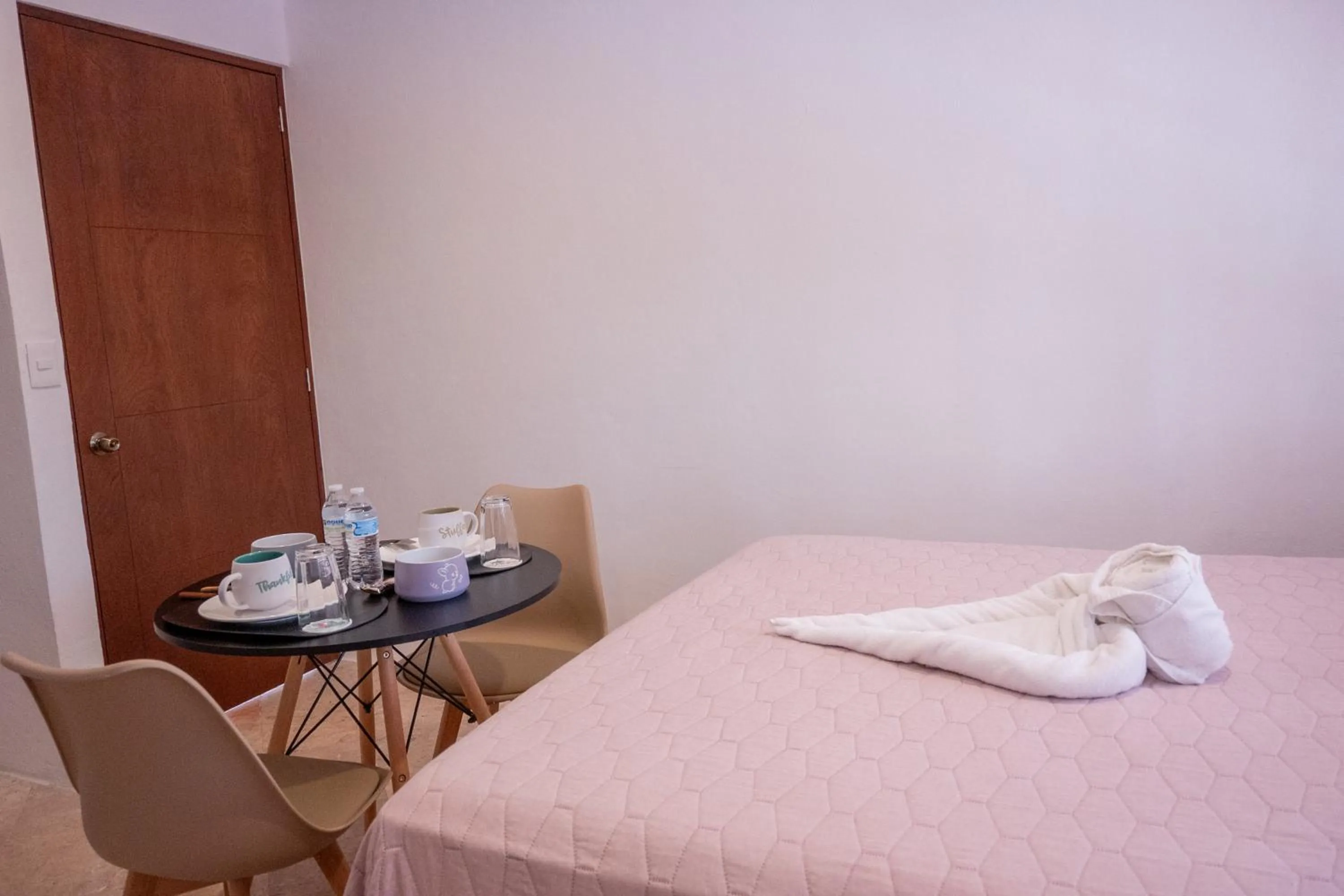 Bed in Cancún Suites Apartments - Hotel Zone