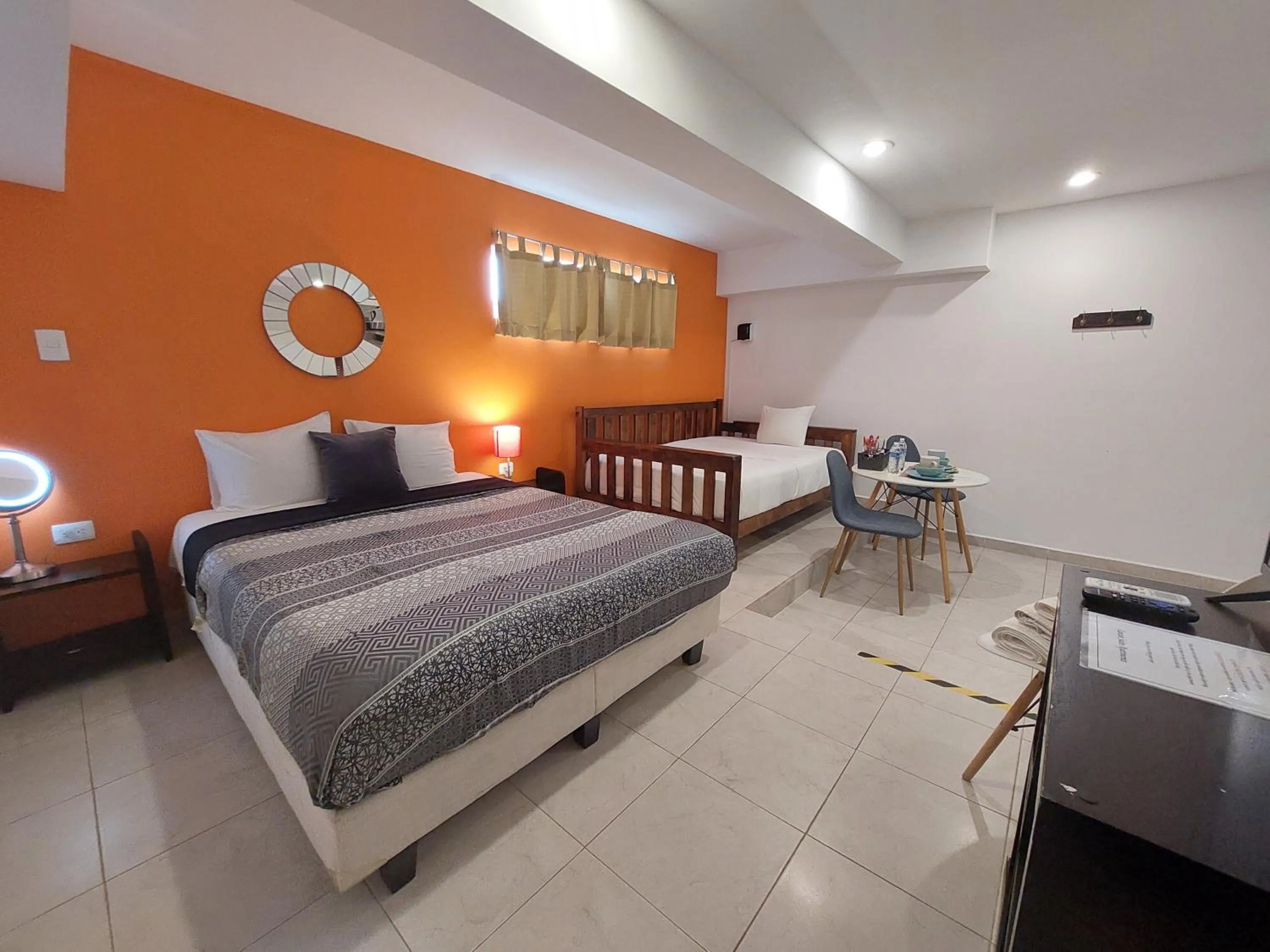 Photo of the whole room, Bed in Cancún Suites Apartments - Hotel Zone