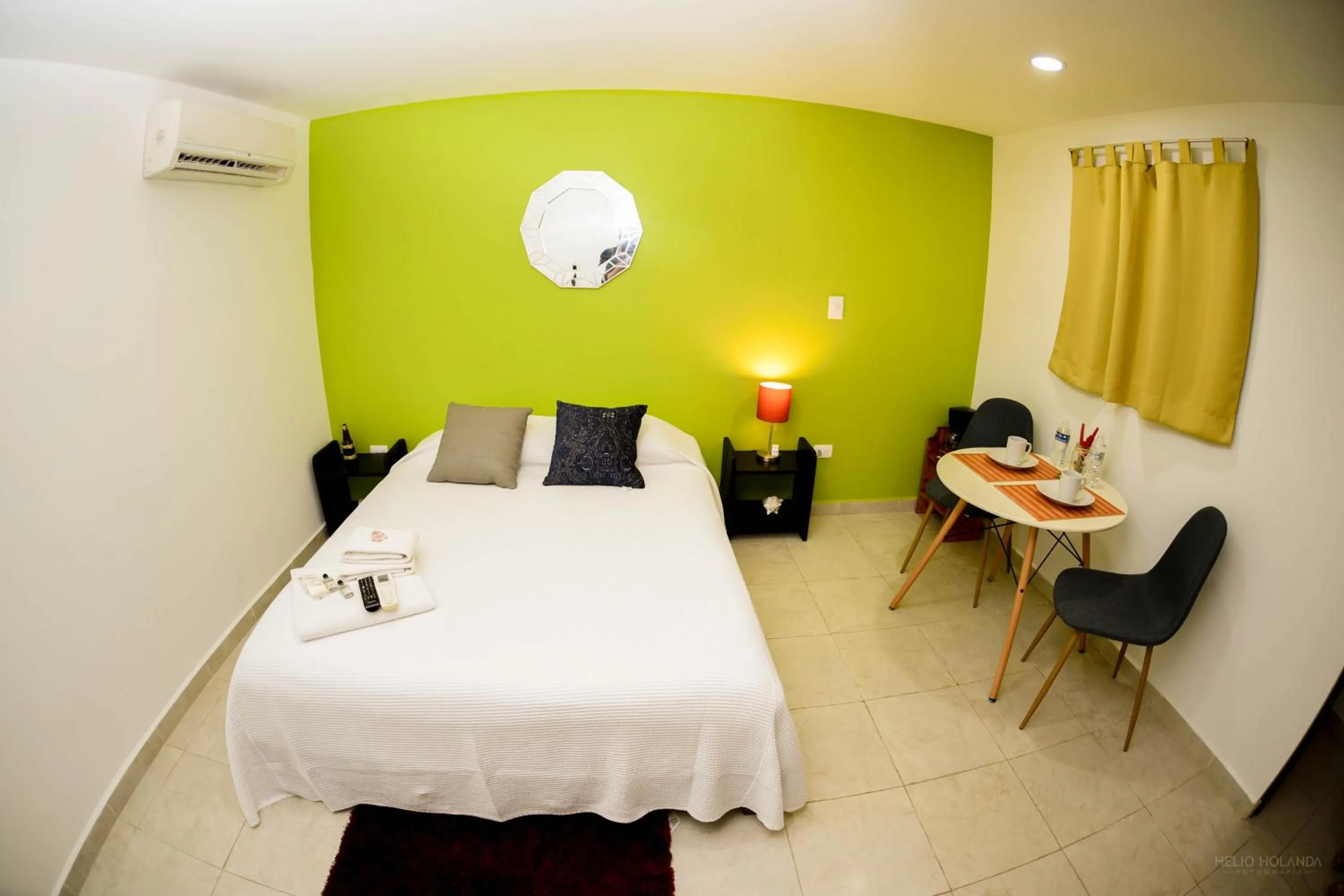 Dining area, Bed in Cancún Suites Apartments - Hotel Zone