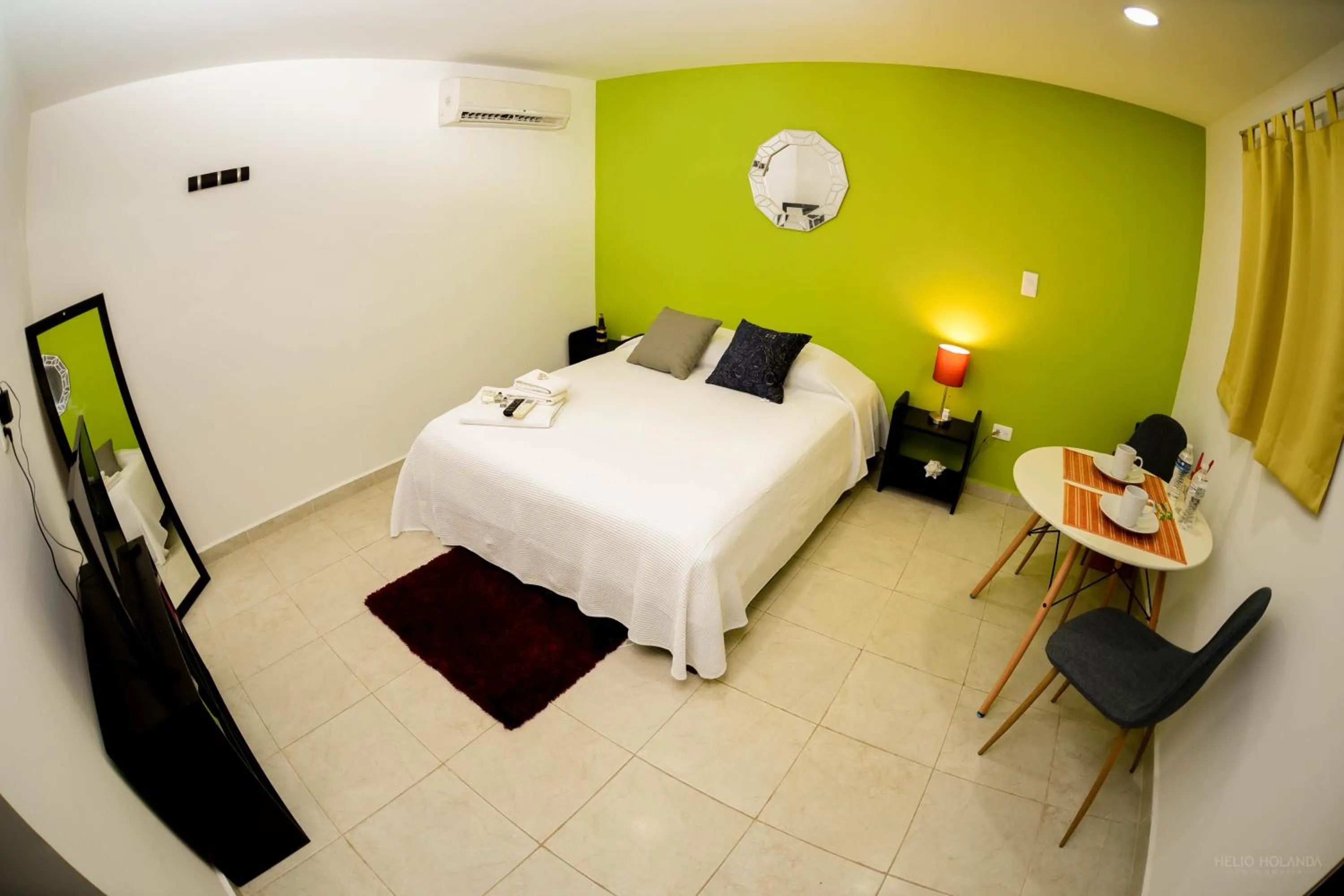 Dining area, Bed in Cancún Suites Apartments - Hotel Zone