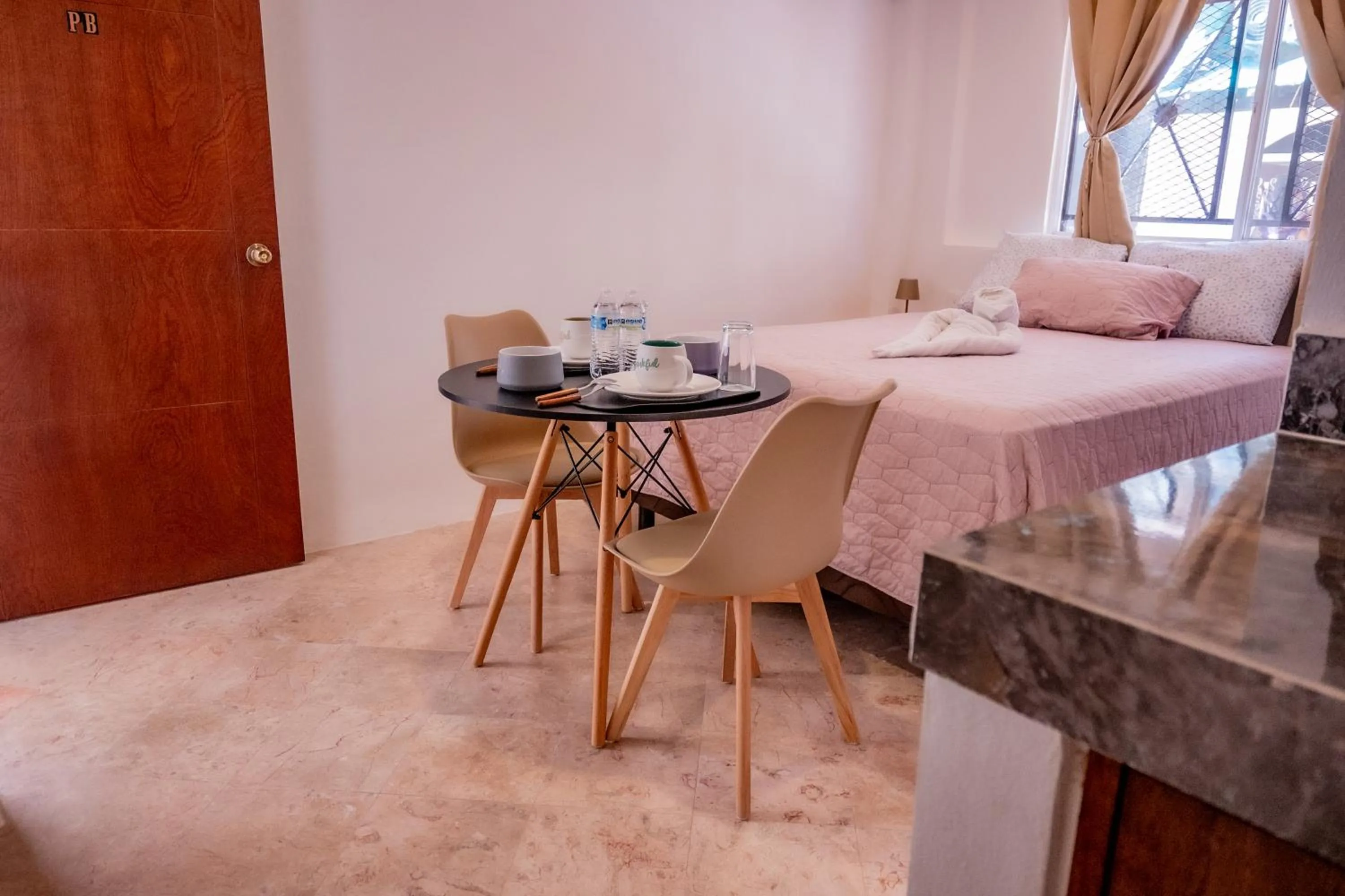 Bed in Cancún Suites Apartments - Hotel Zone