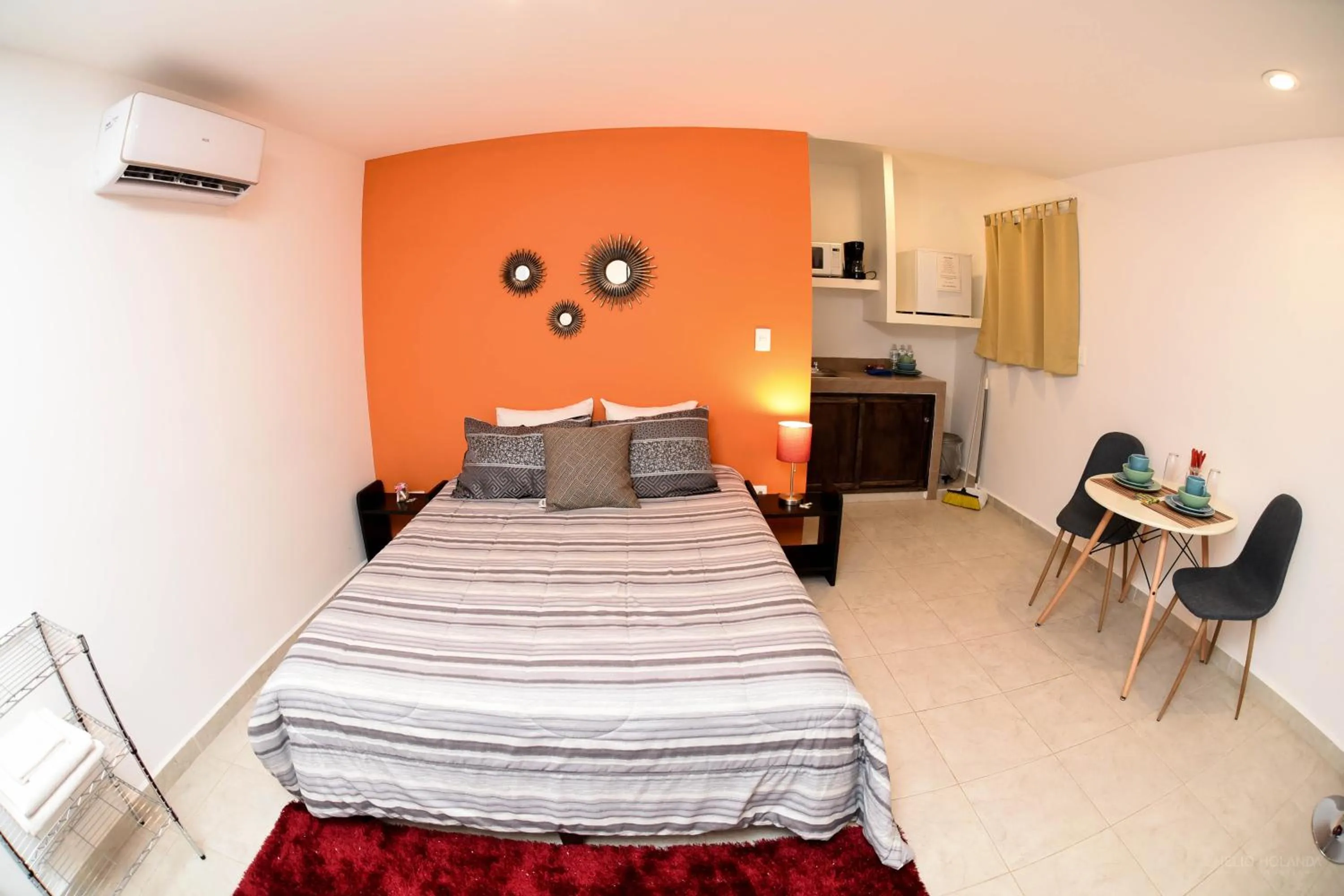 Kitchen or kitchenette, Bed in Cancún Suites Apartments - Hotel Zone