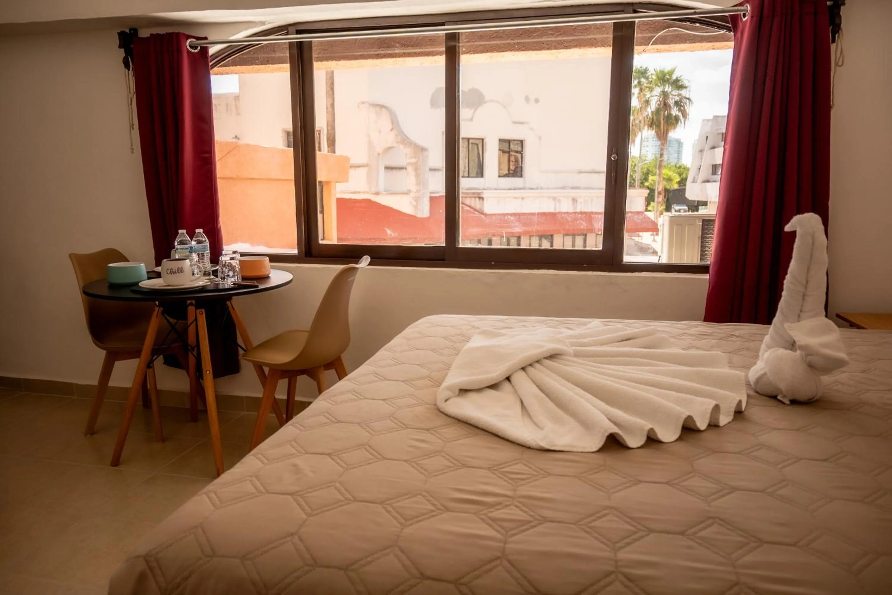 Photo of the whole room, Bed in Cancún Suites Apartments - Hotel Zone