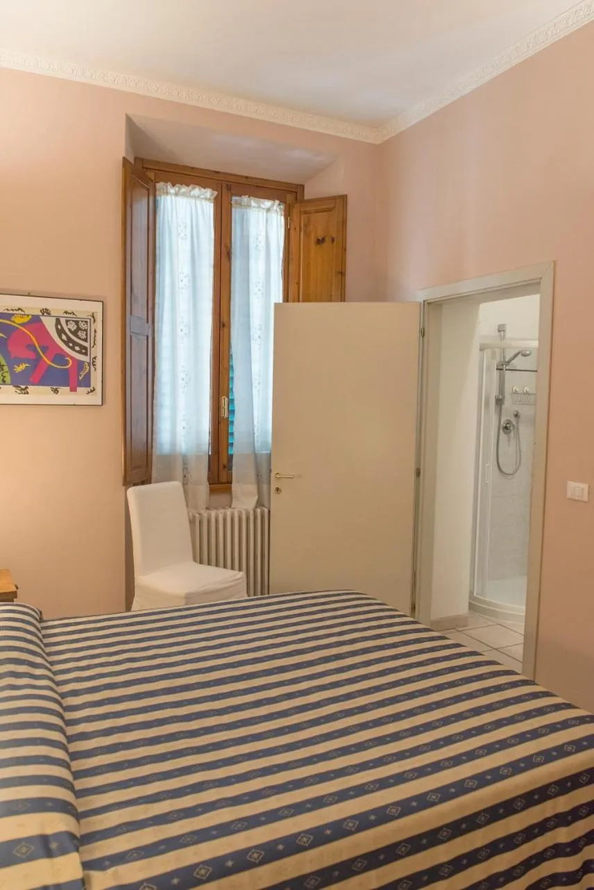 Bed in Affittacamere Benedetta