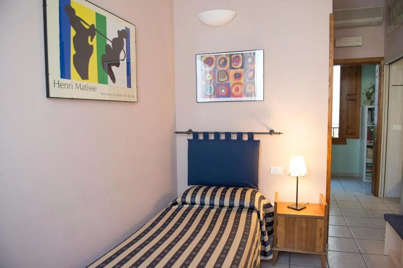 Bed in Affittacamere Benedetta