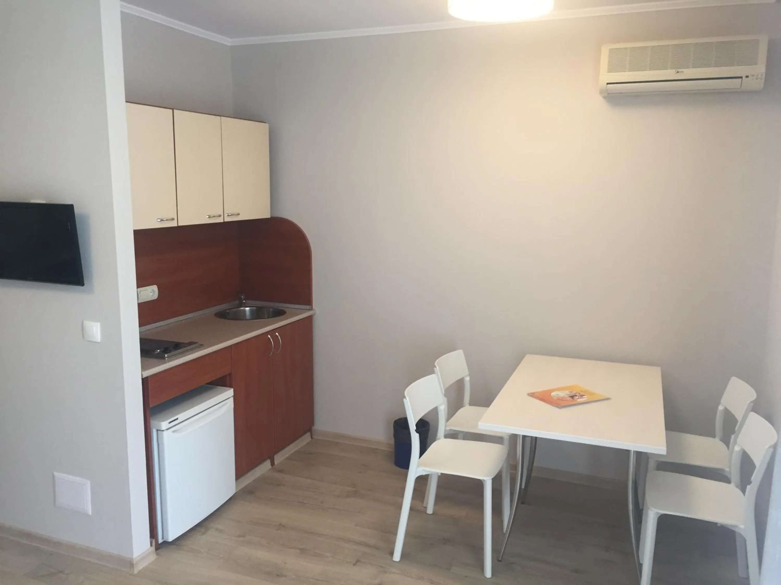 Kitchen or kitchenette in Helios Hotel