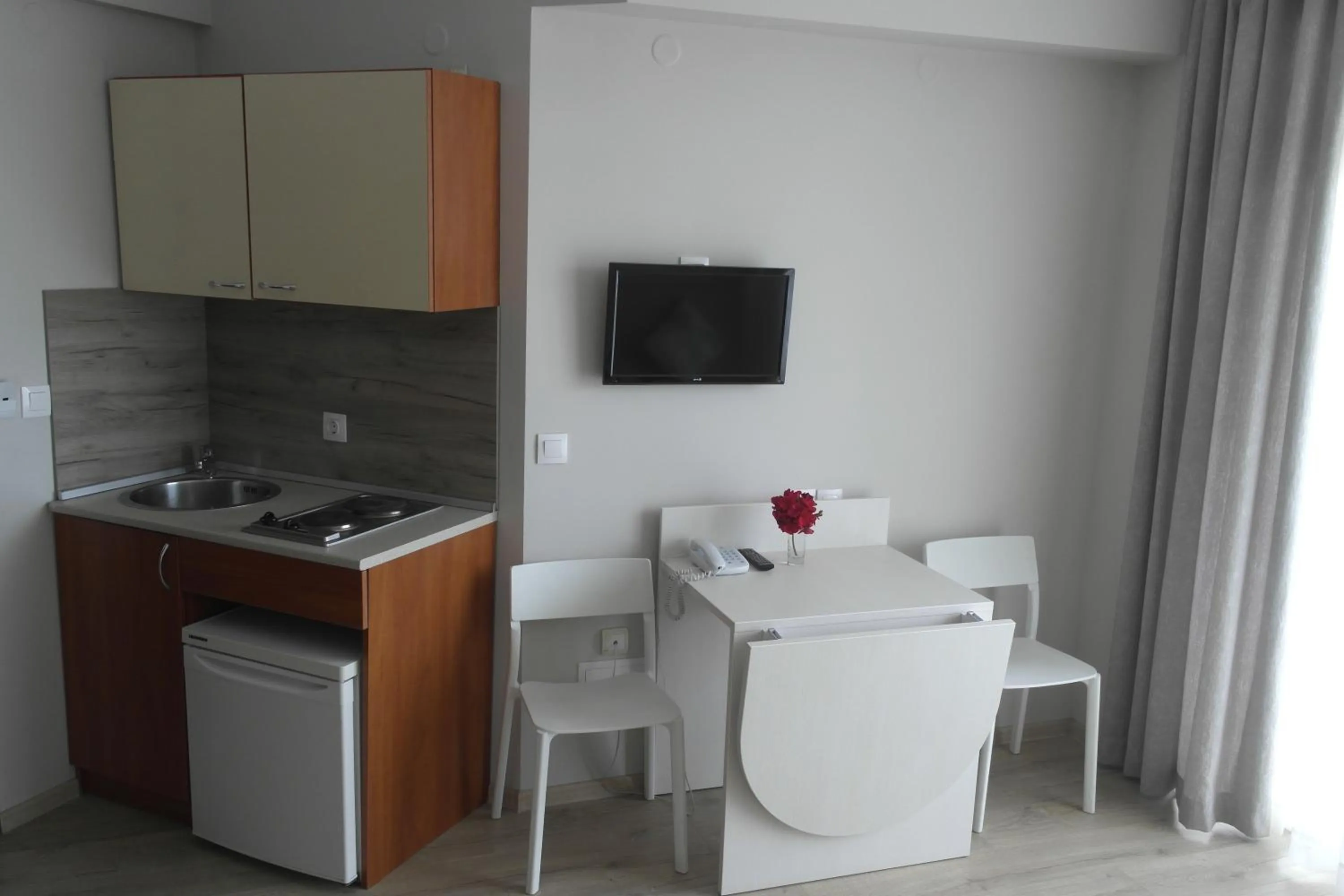 Kitchen or kitchenette in Helios Hotel