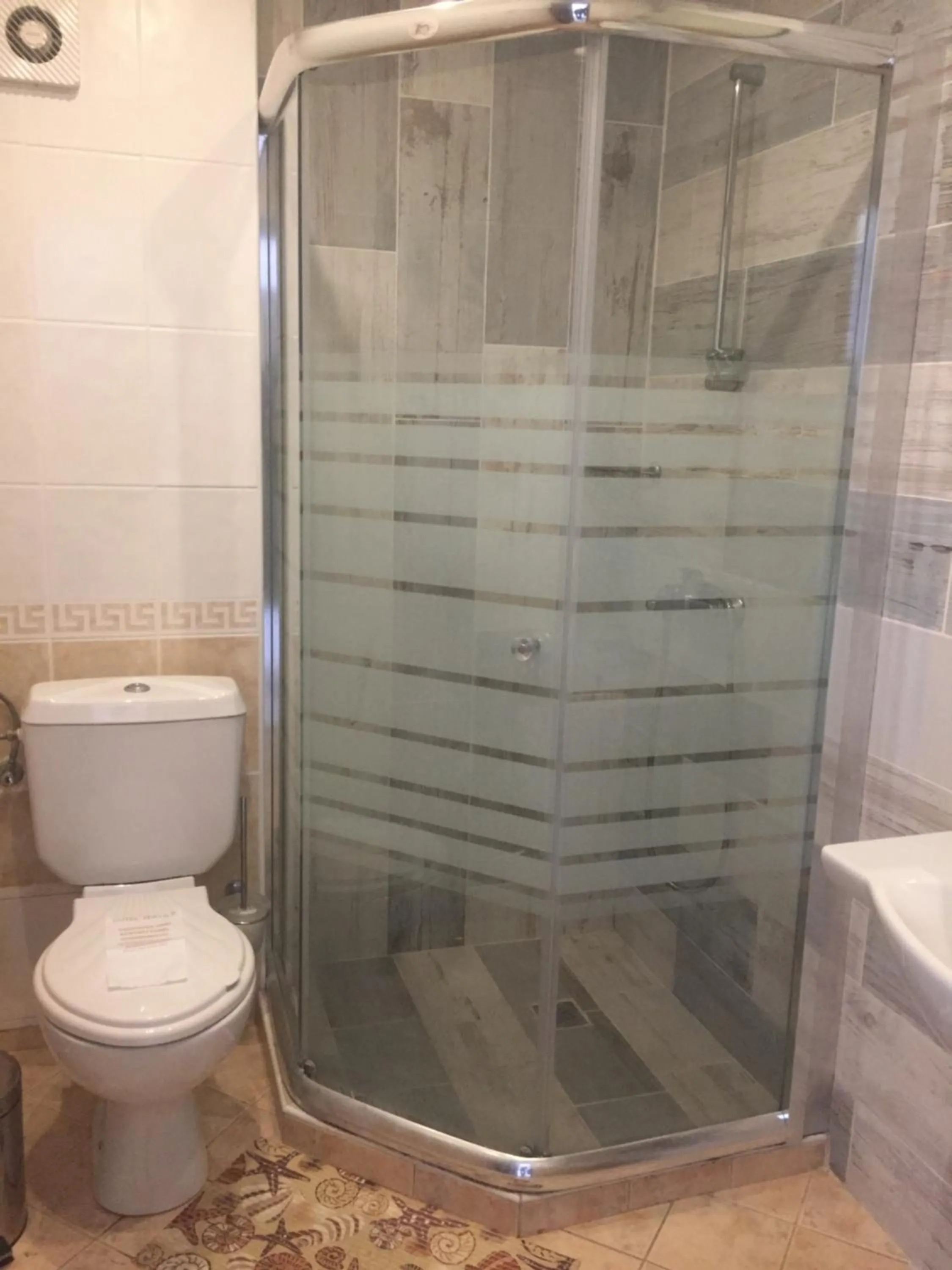 Bathroom in Helios Hotel