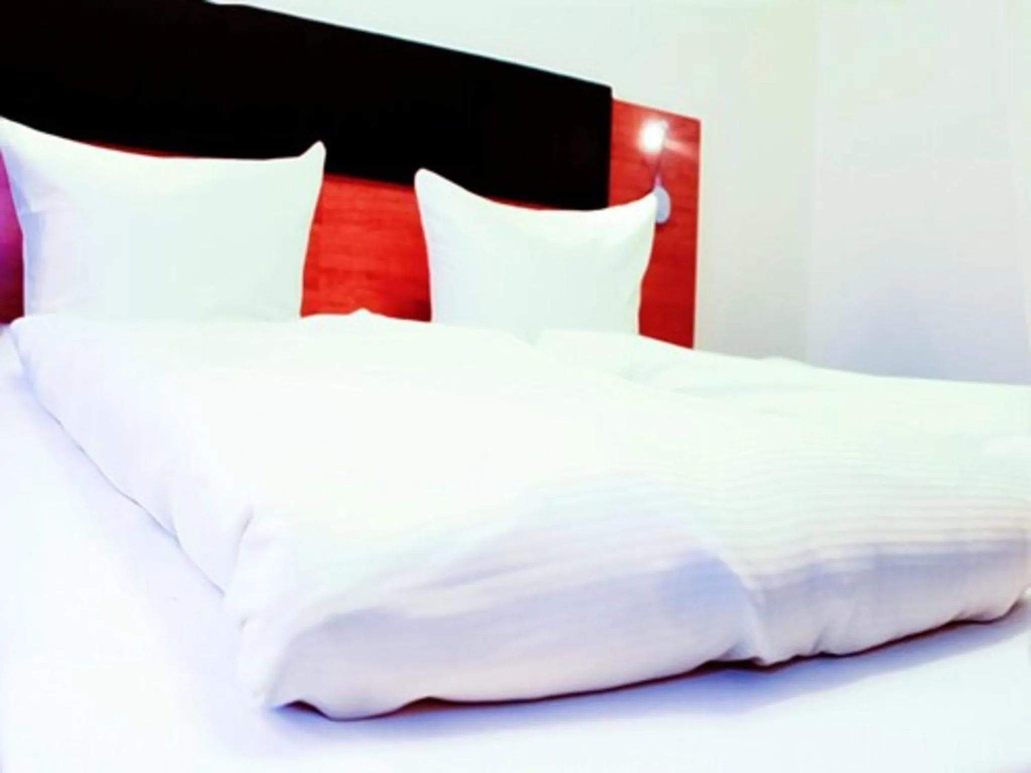 Bed in Hotel Expo Frankfurt City Centre - Self Check-In