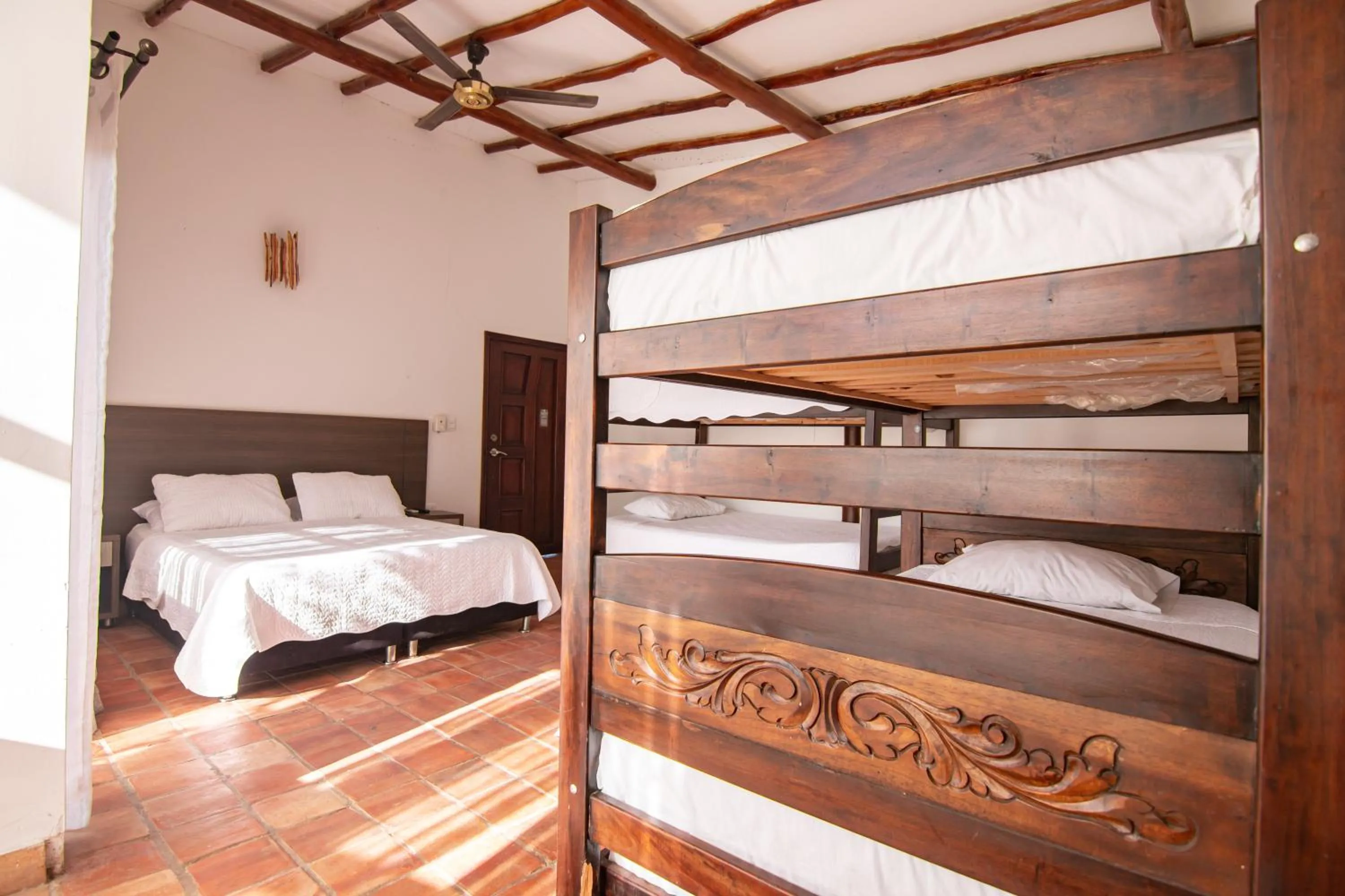 Bed in Portales del Tayrona Garden Hotel
