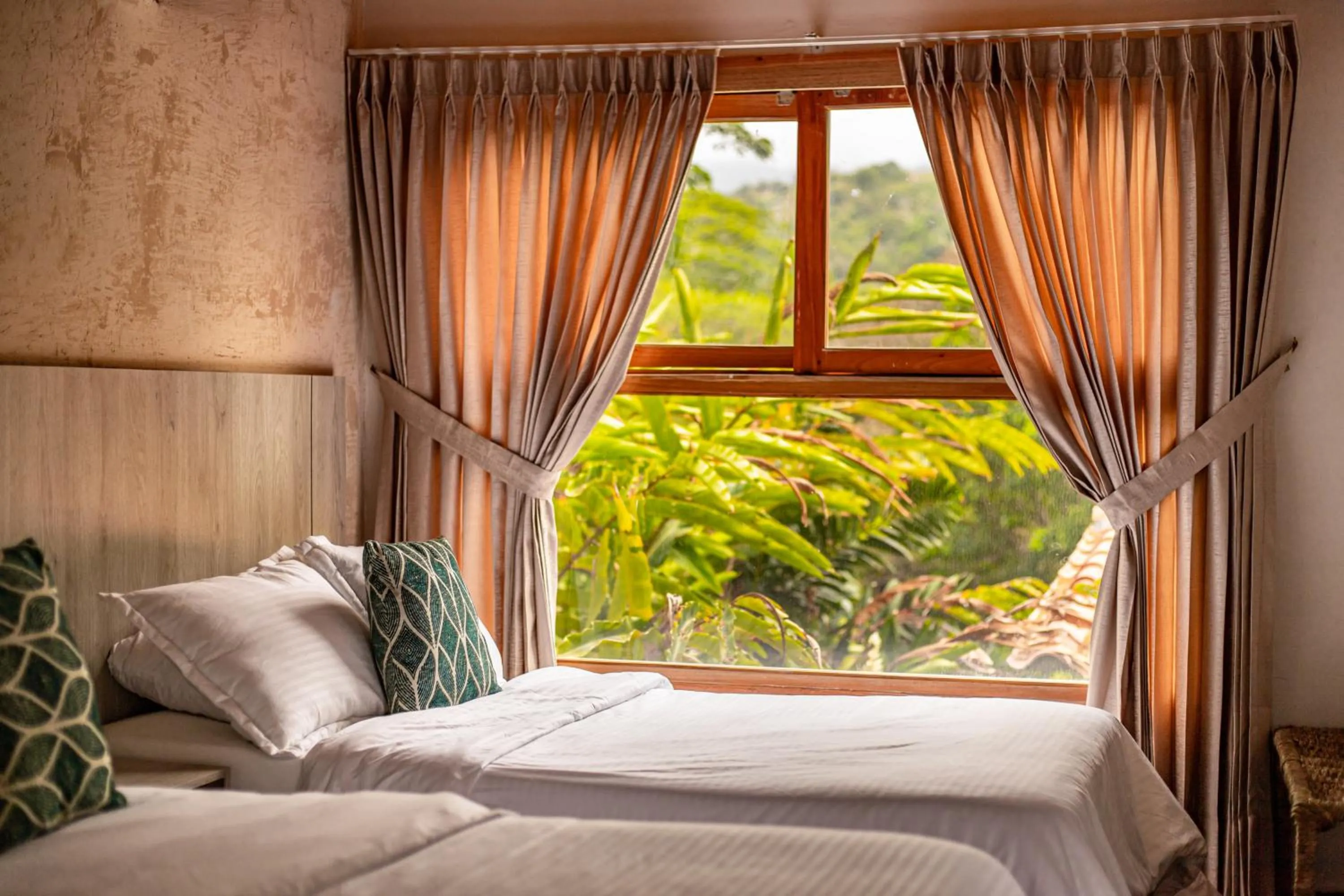 Bed in Portales del Tayrona Garden Hotel
