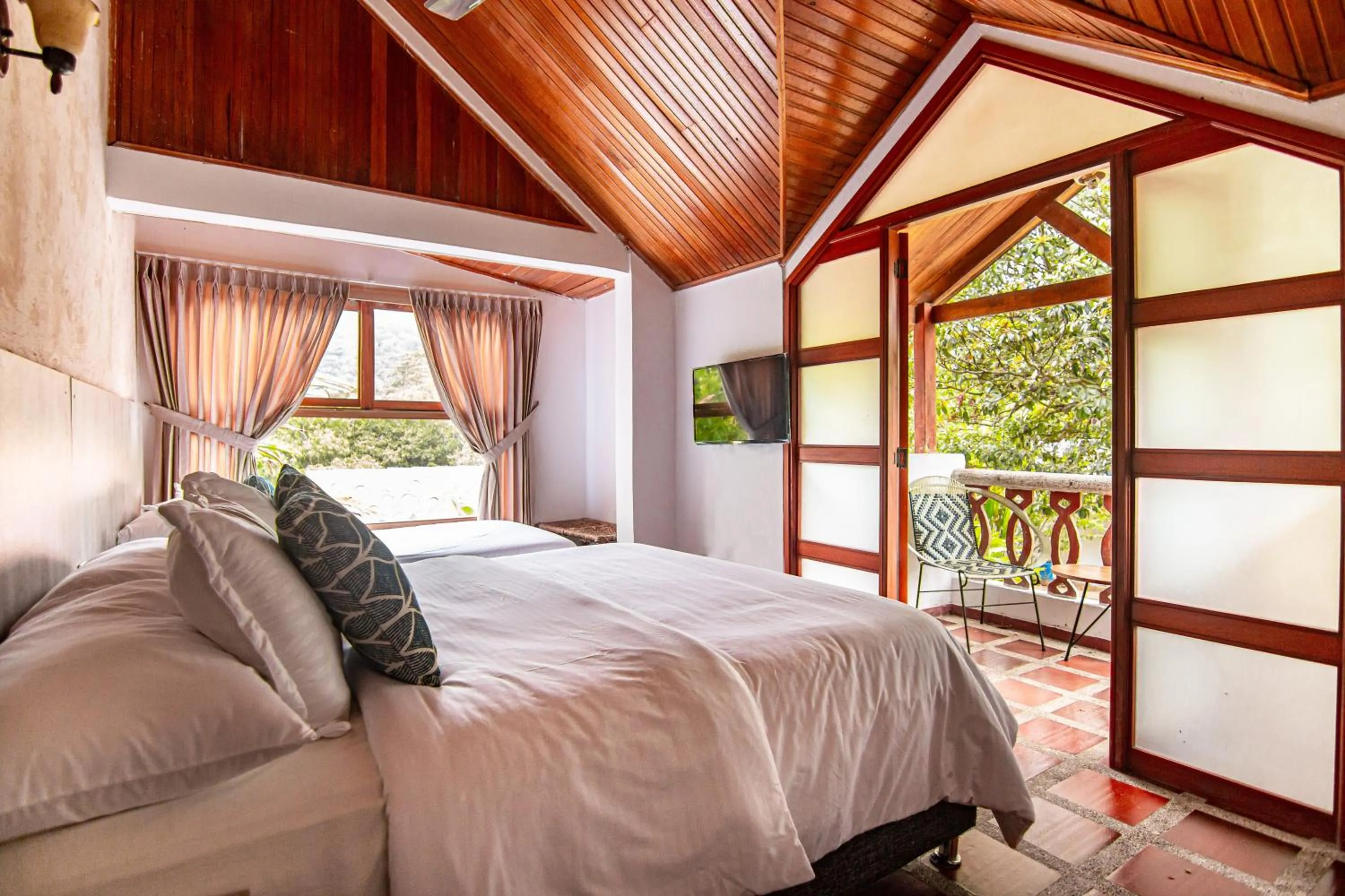 Bed in Portales del Tayrona Garden Hotel