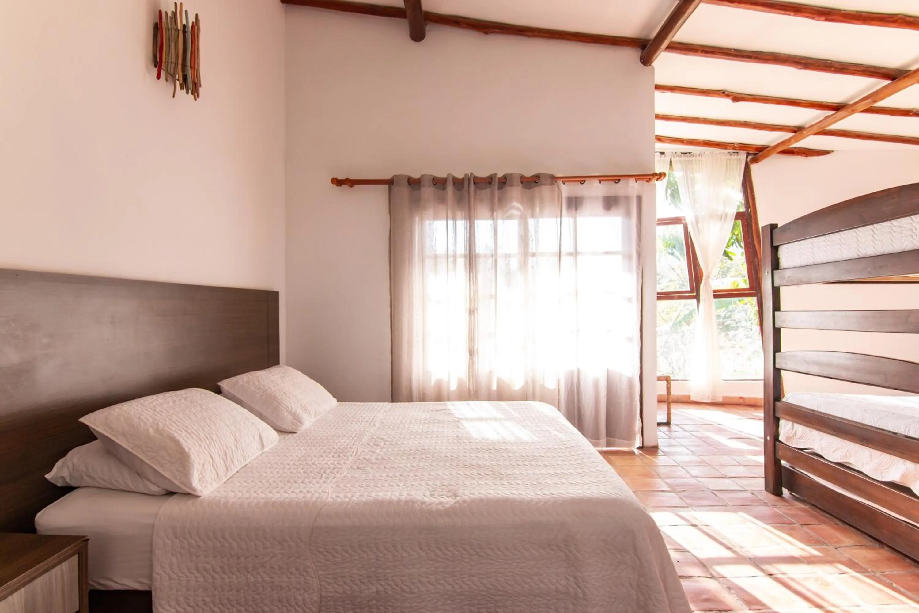 Photo of the whole room, Bed in Portales del Tayrona Garden Hotel