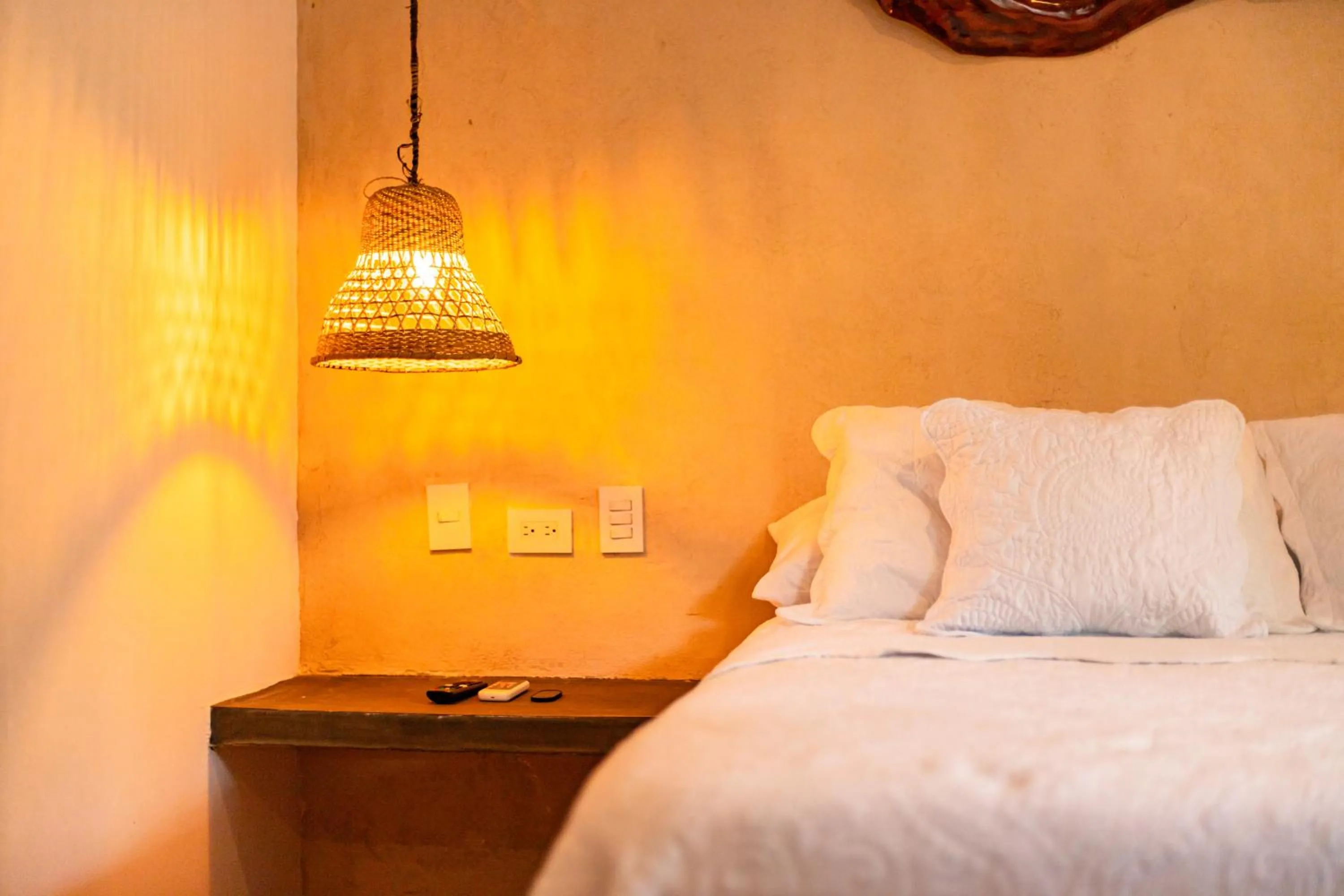 Bed in Portales del Tayrona Garden Hotel