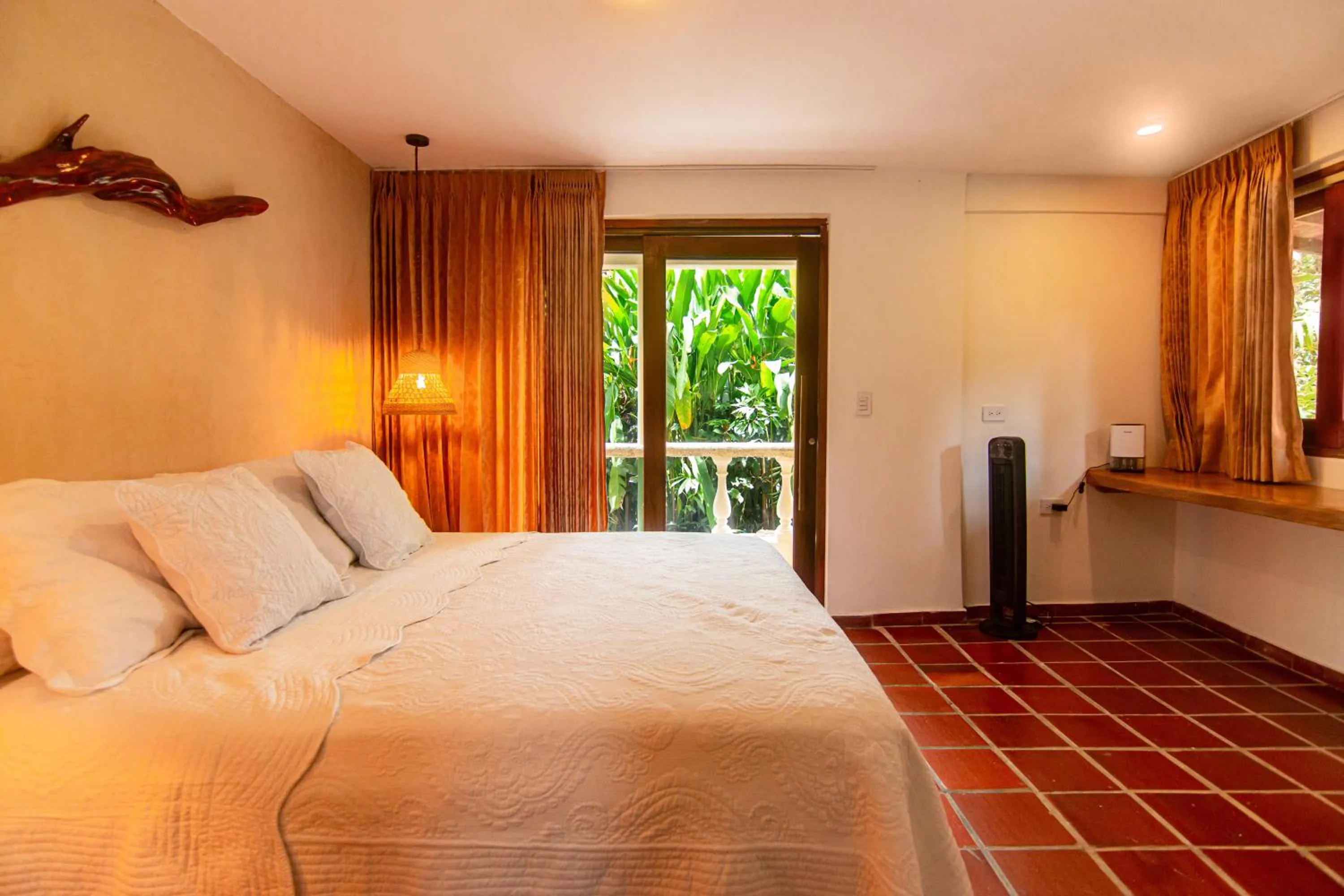 Bed in Portales del Tayrona Garden Hotel