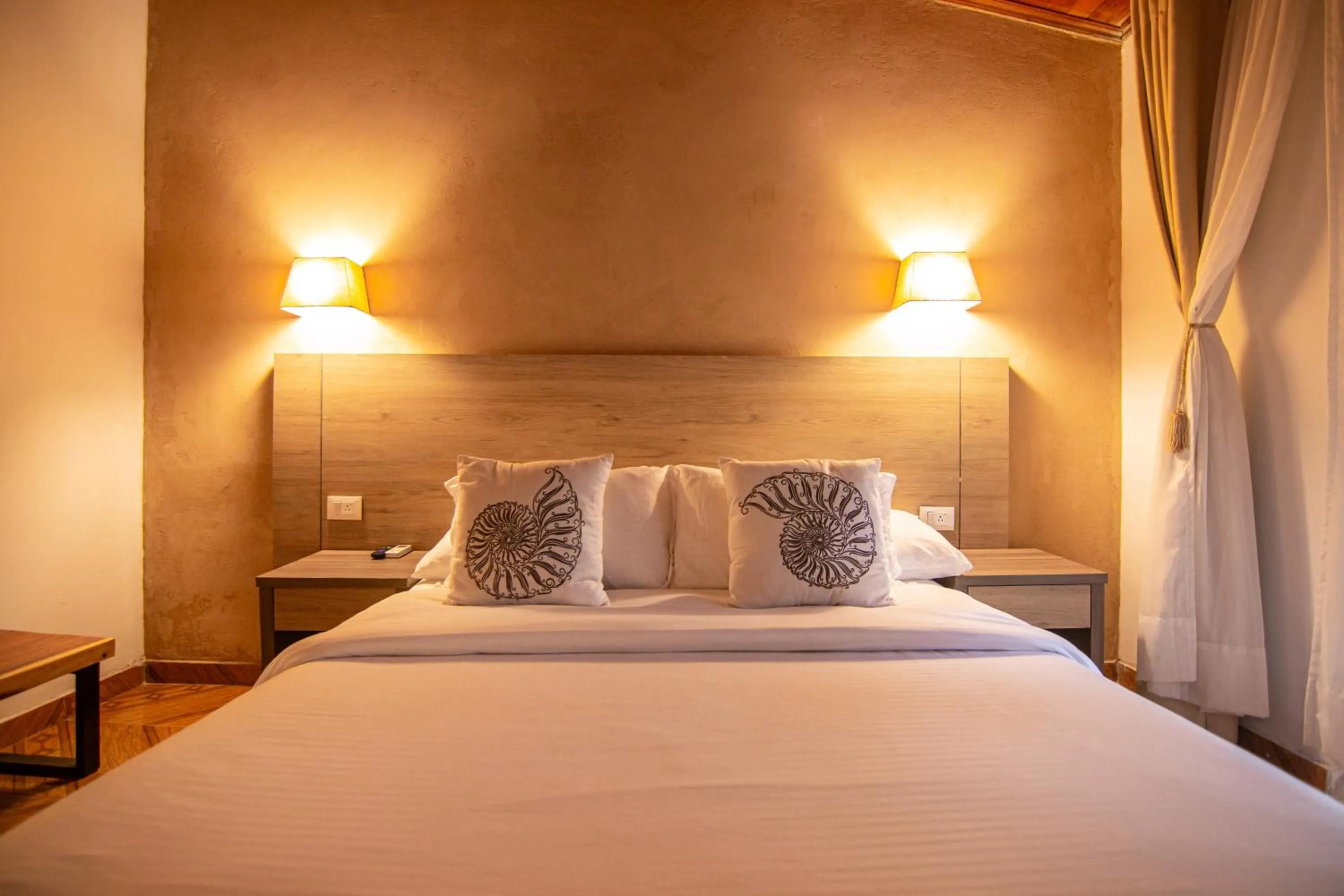 Bed in Portales del Tayrona Garden Hotel