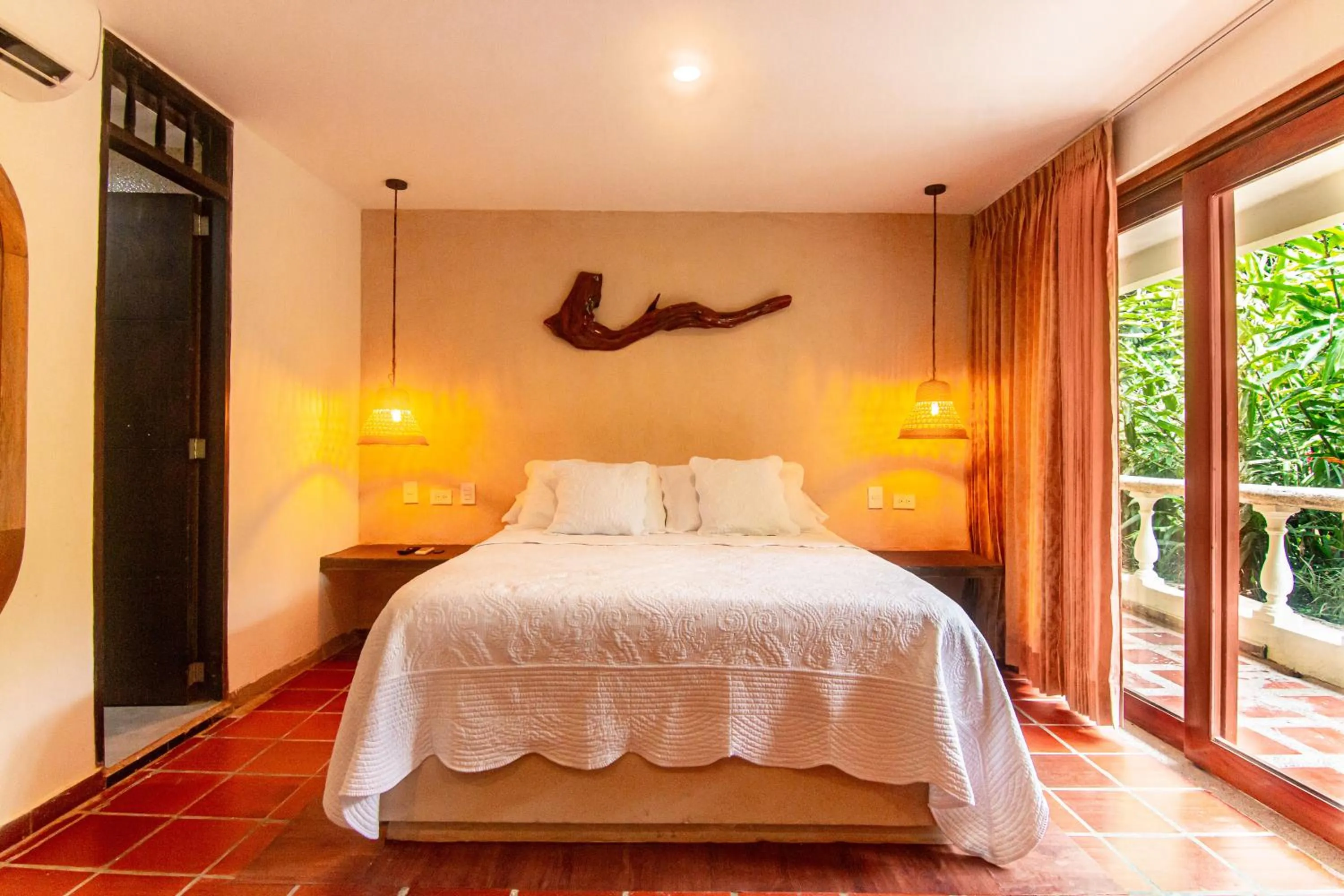 Bed in Portales del Tayrona Garden Hotel