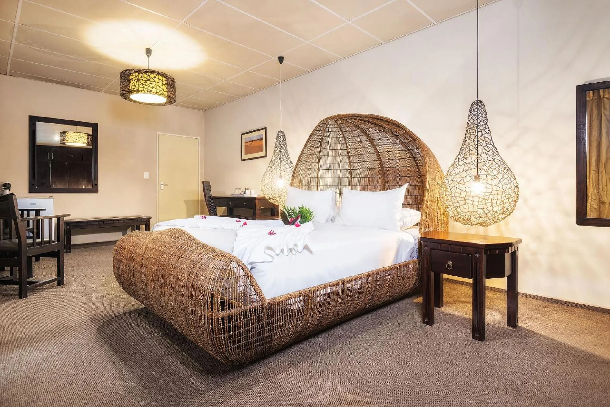 Bed in Protea Hotel by Marriott Zambezi River Lodge