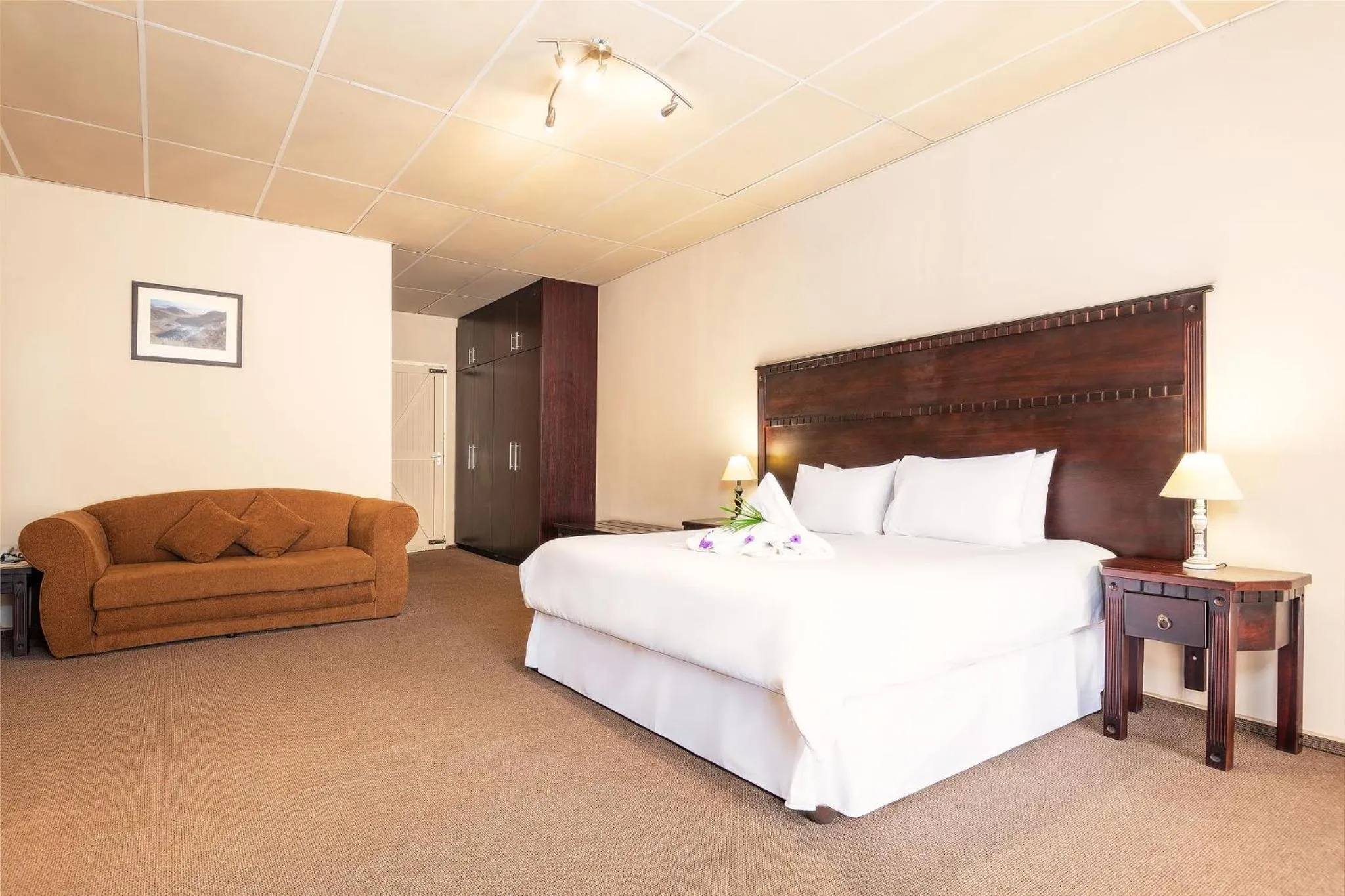 Bed in Protea Hotel by Marriott Zambezi River Lodge