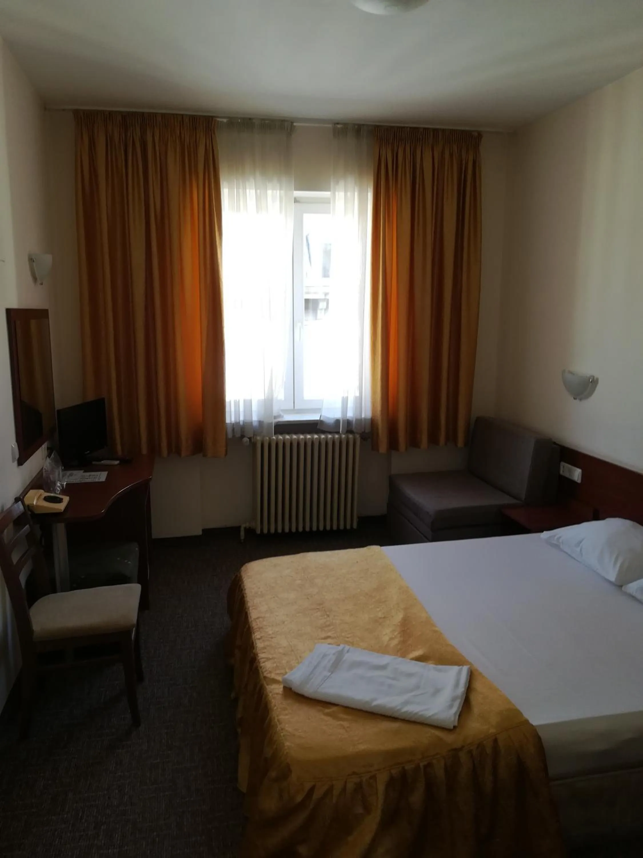 Photo of the whole room, Bed in Slavyanska Beseda Hotel