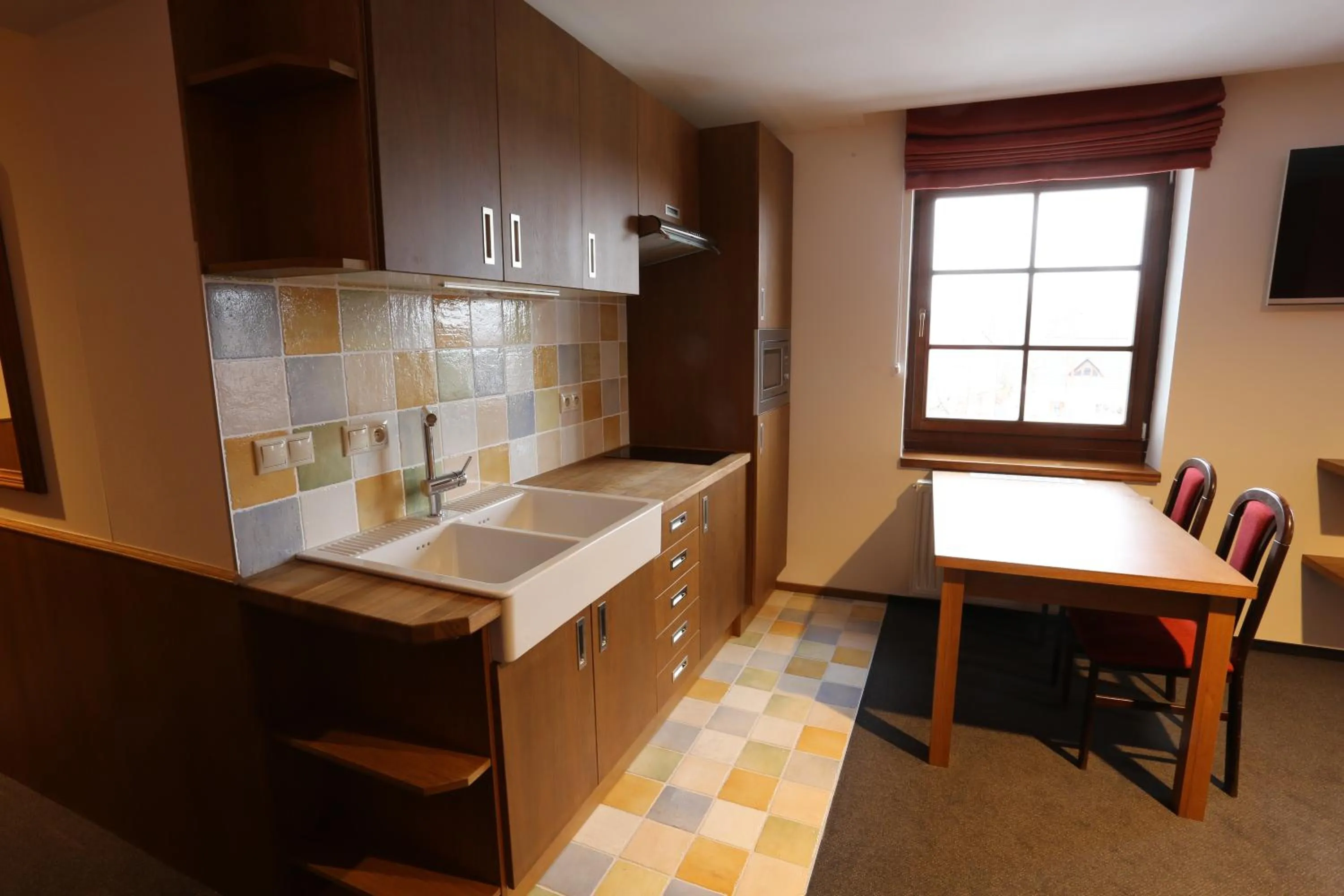Kitchen or kitchenette in Hotel Hajčman