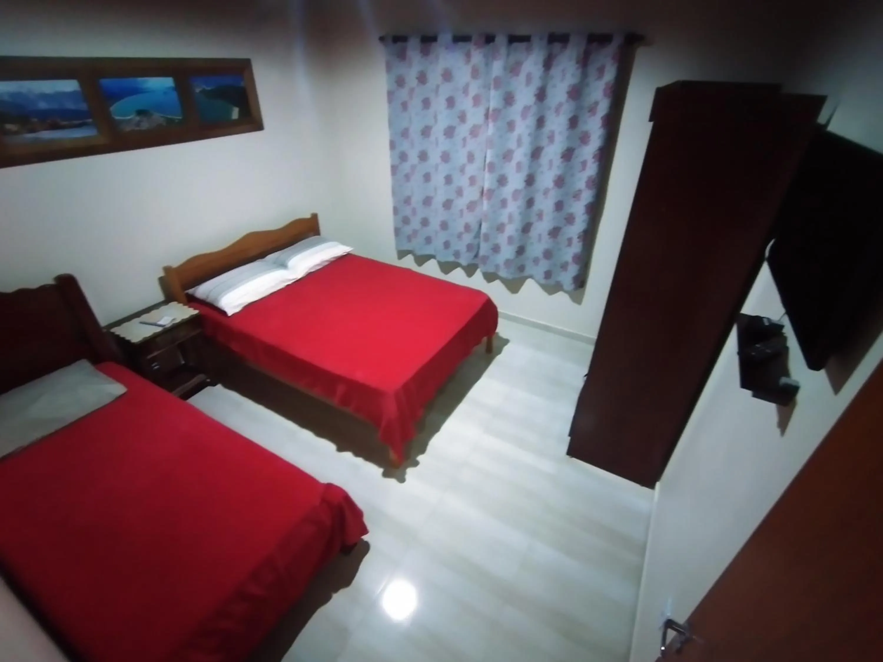 Photo of the whole room, Bed in Residencial Pérola - Localizado entre a Pinheira e a Guarda do Embaú