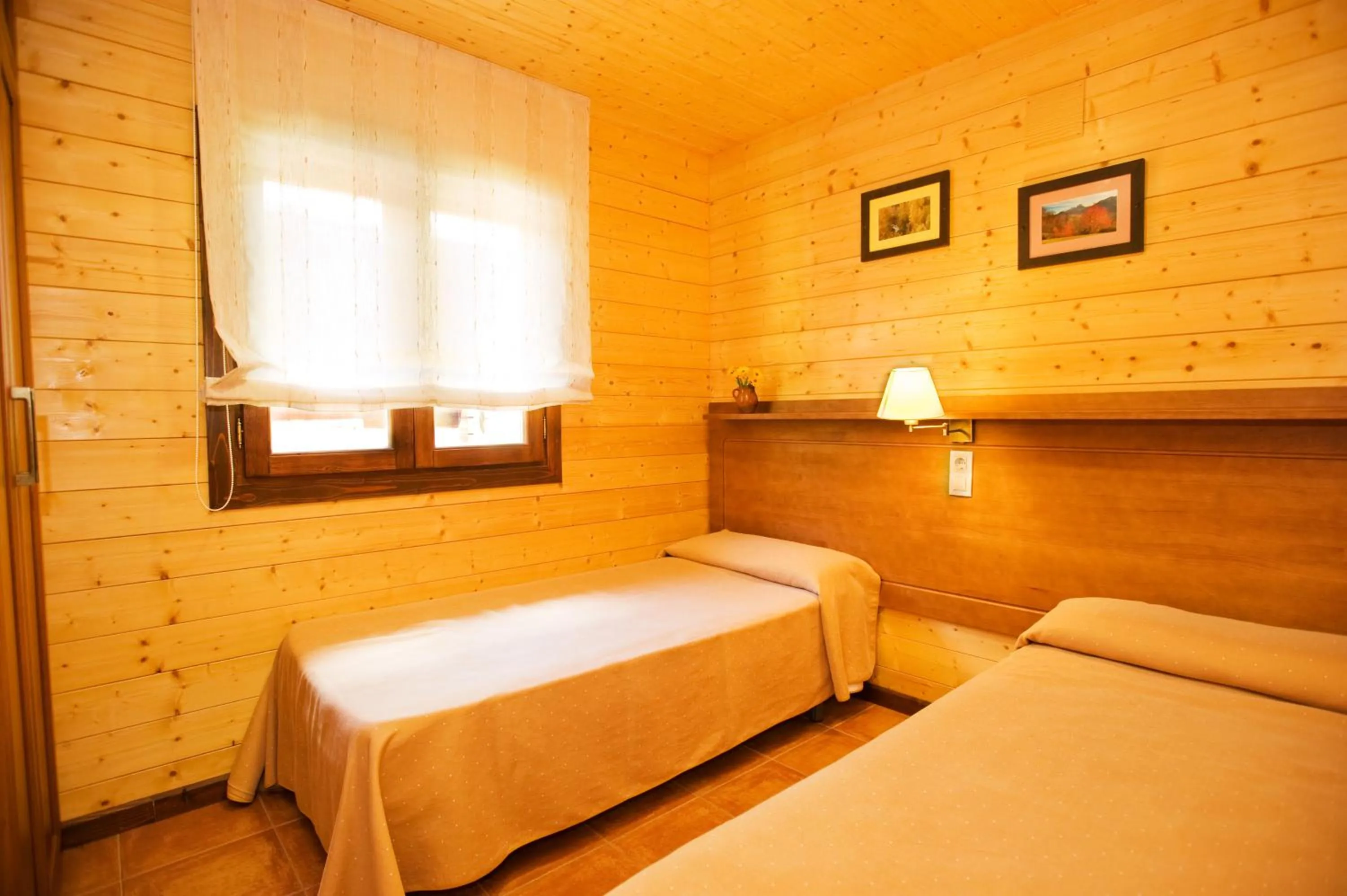 Bed in Bungalows La Borda d´Arnaldet