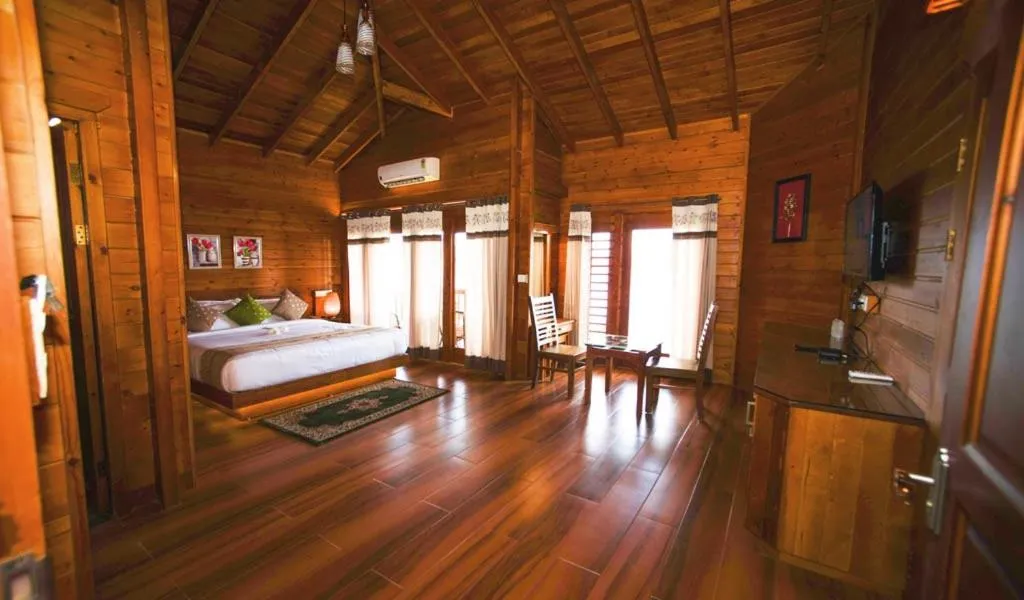 Bed in LakeRose Wayanad Resort