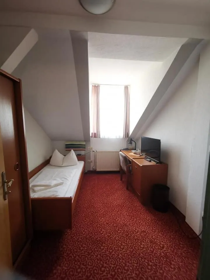 Photo of the whole room, Bed in Stadthotel Hauser Eck