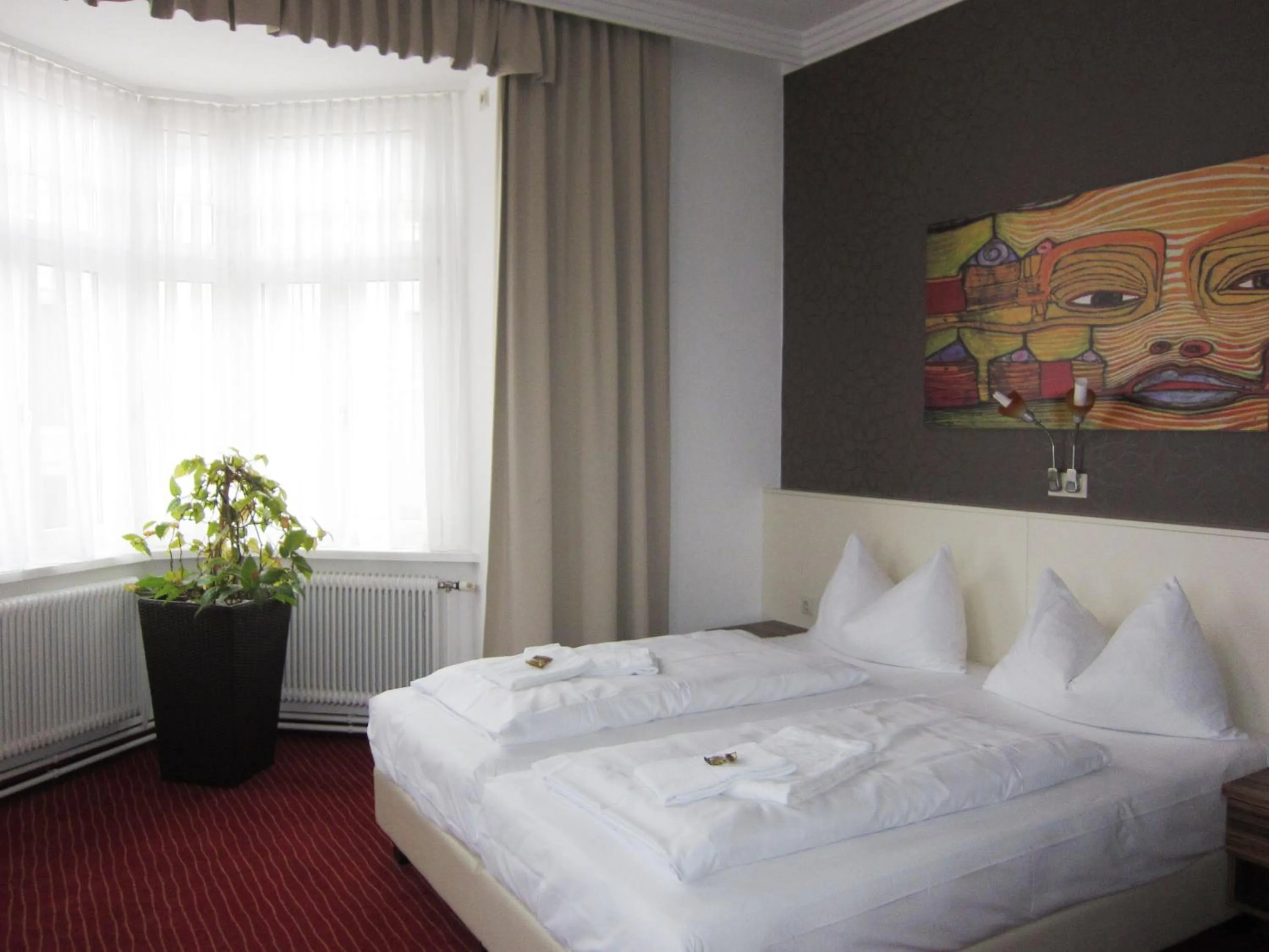 Bed in Stadthotel Hauser Eck