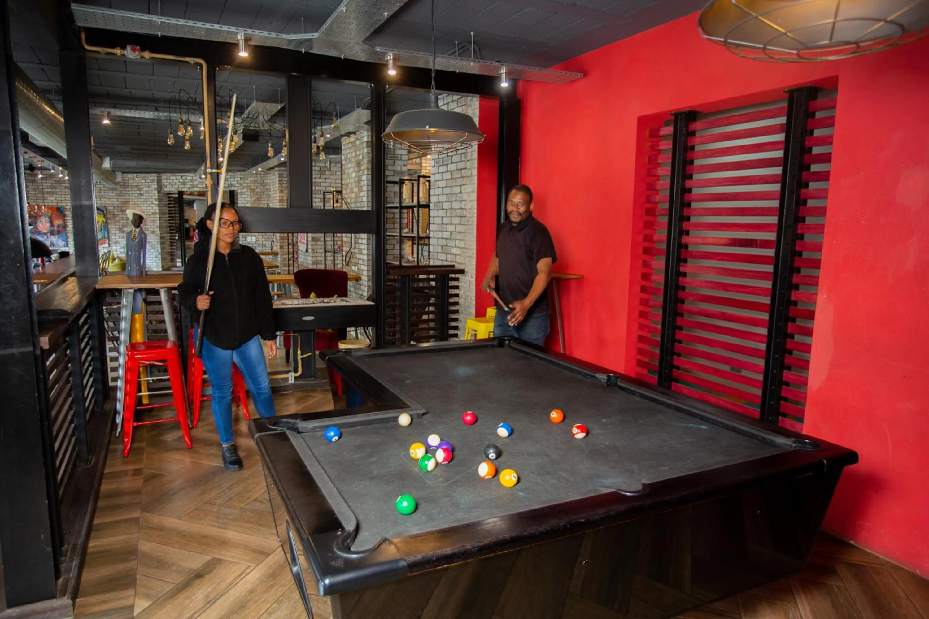 Communal lounge/ TV room in 26° South Bush Boho Hotel