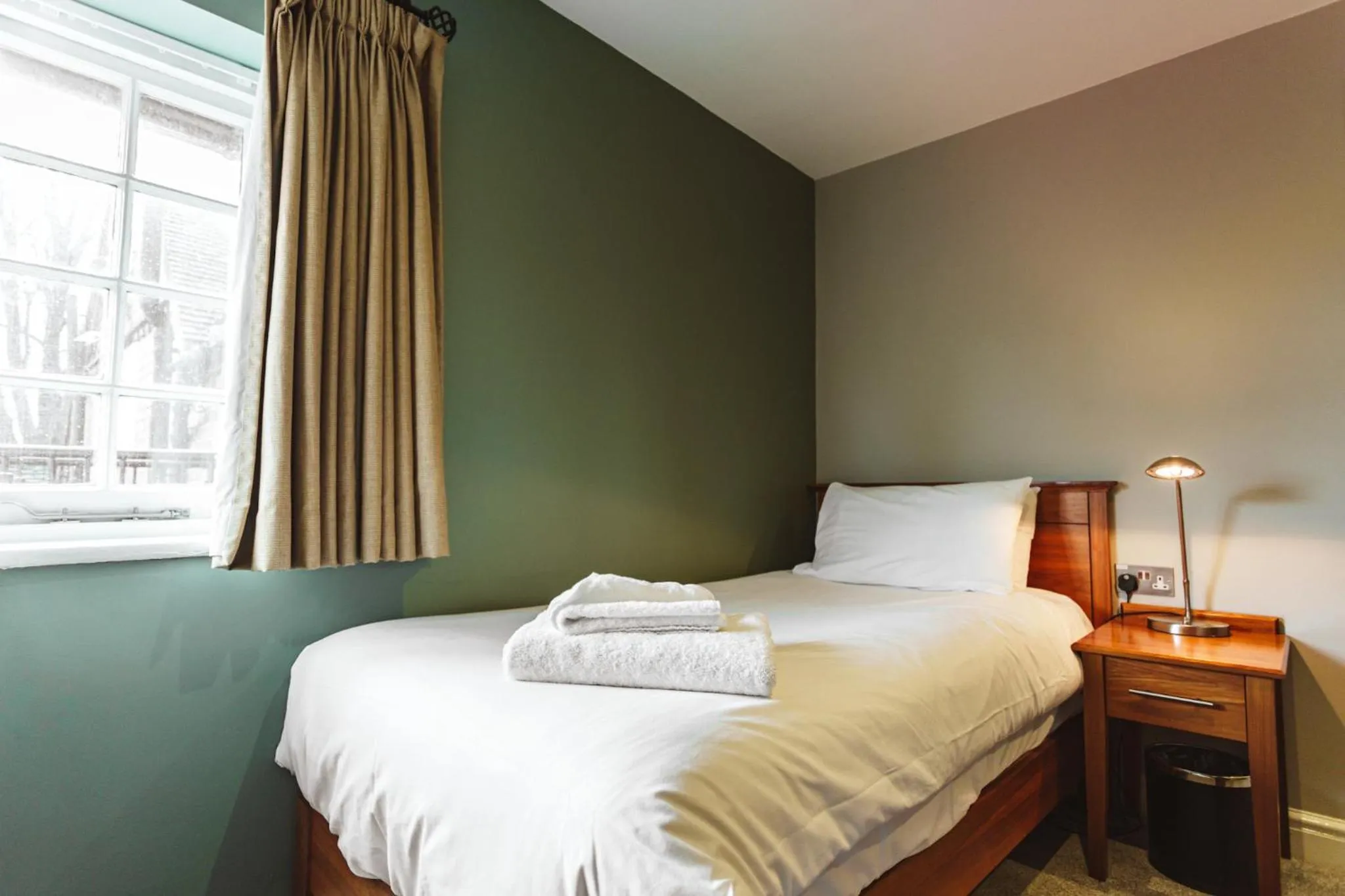 Bed in The Dog & Doublet Inn