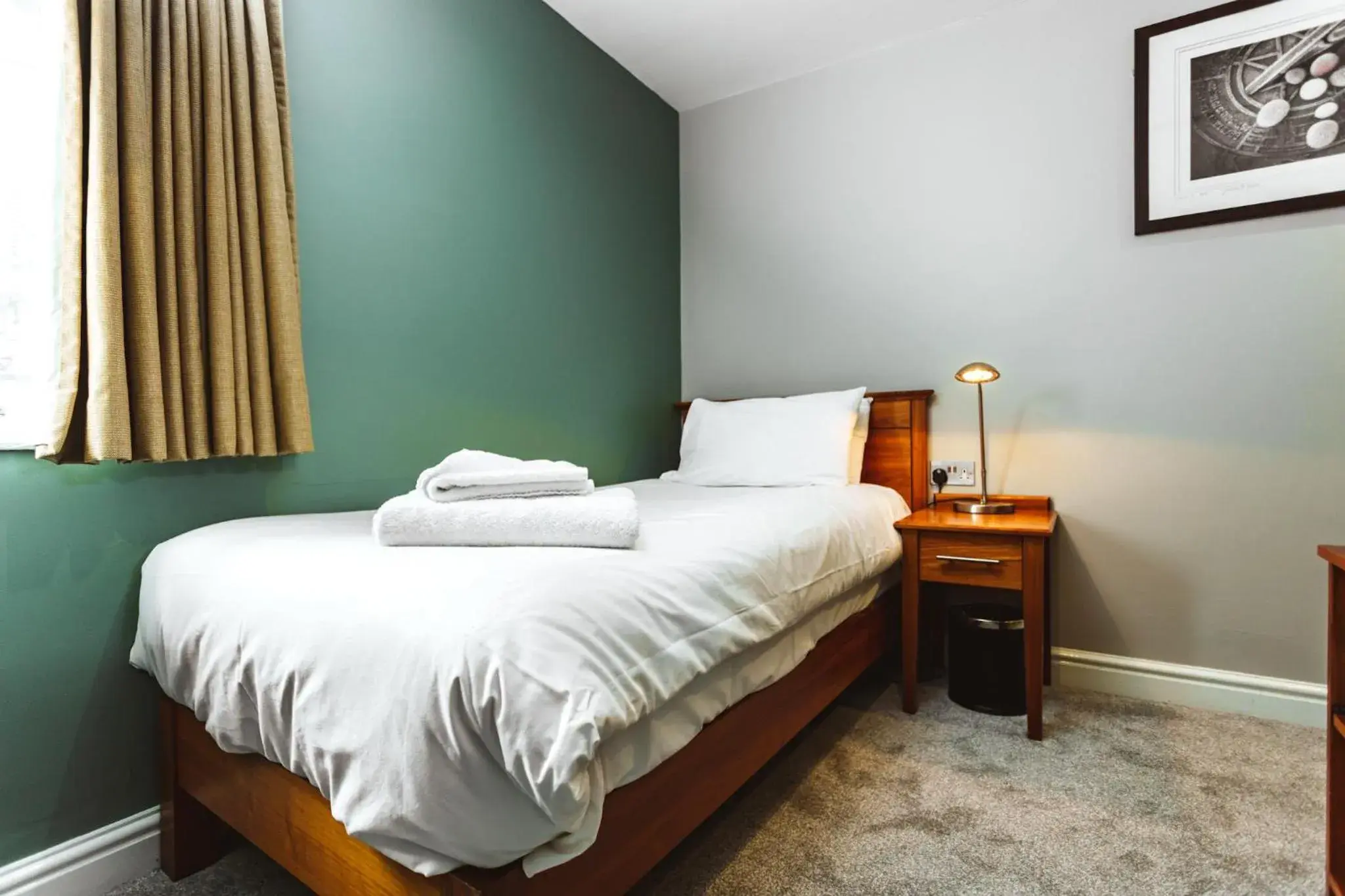 Bed in The Dog & Doublet Inn Bed in The Dog & Doublet Inn