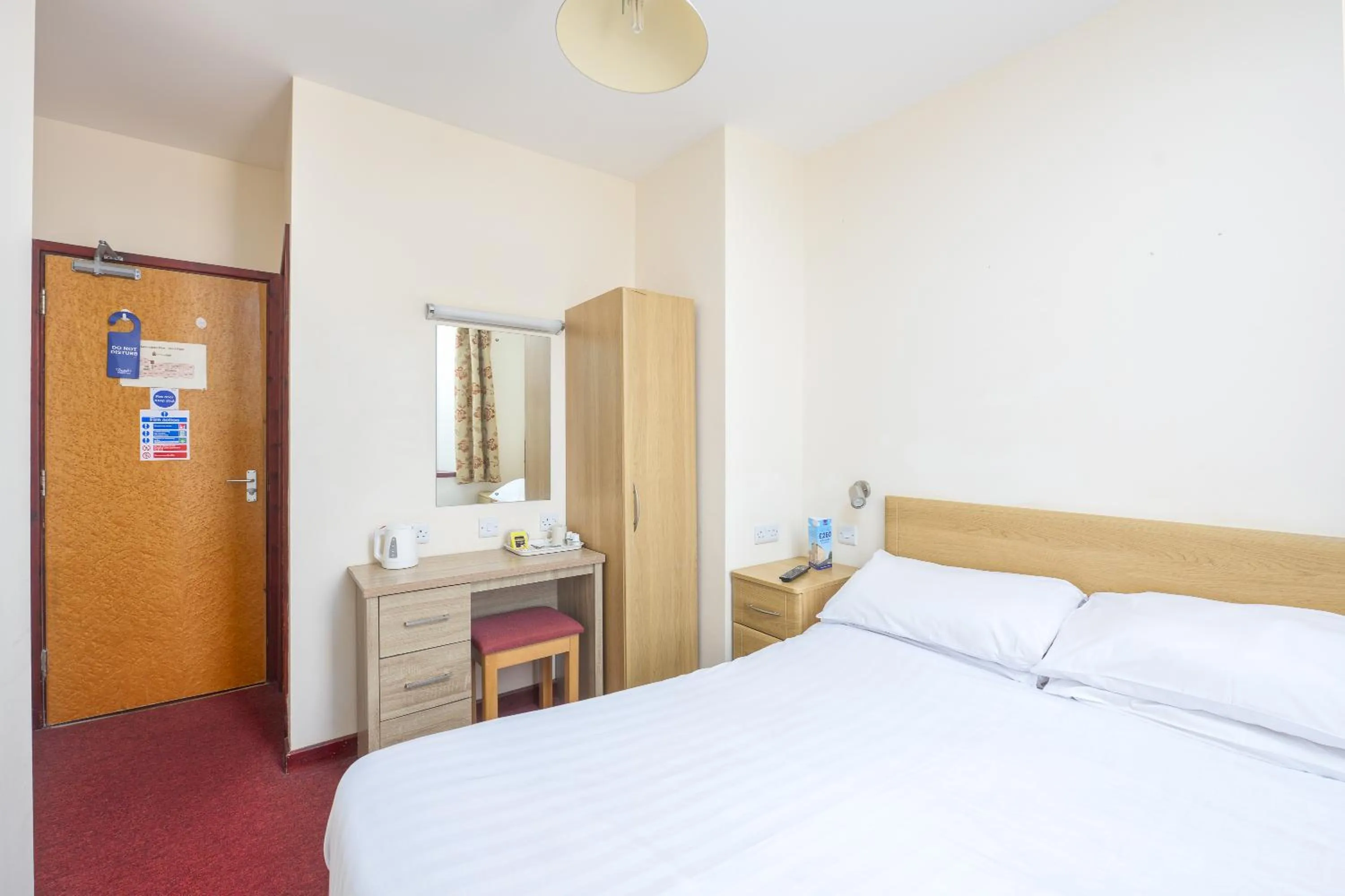 Bed in The Sandringham Hotel