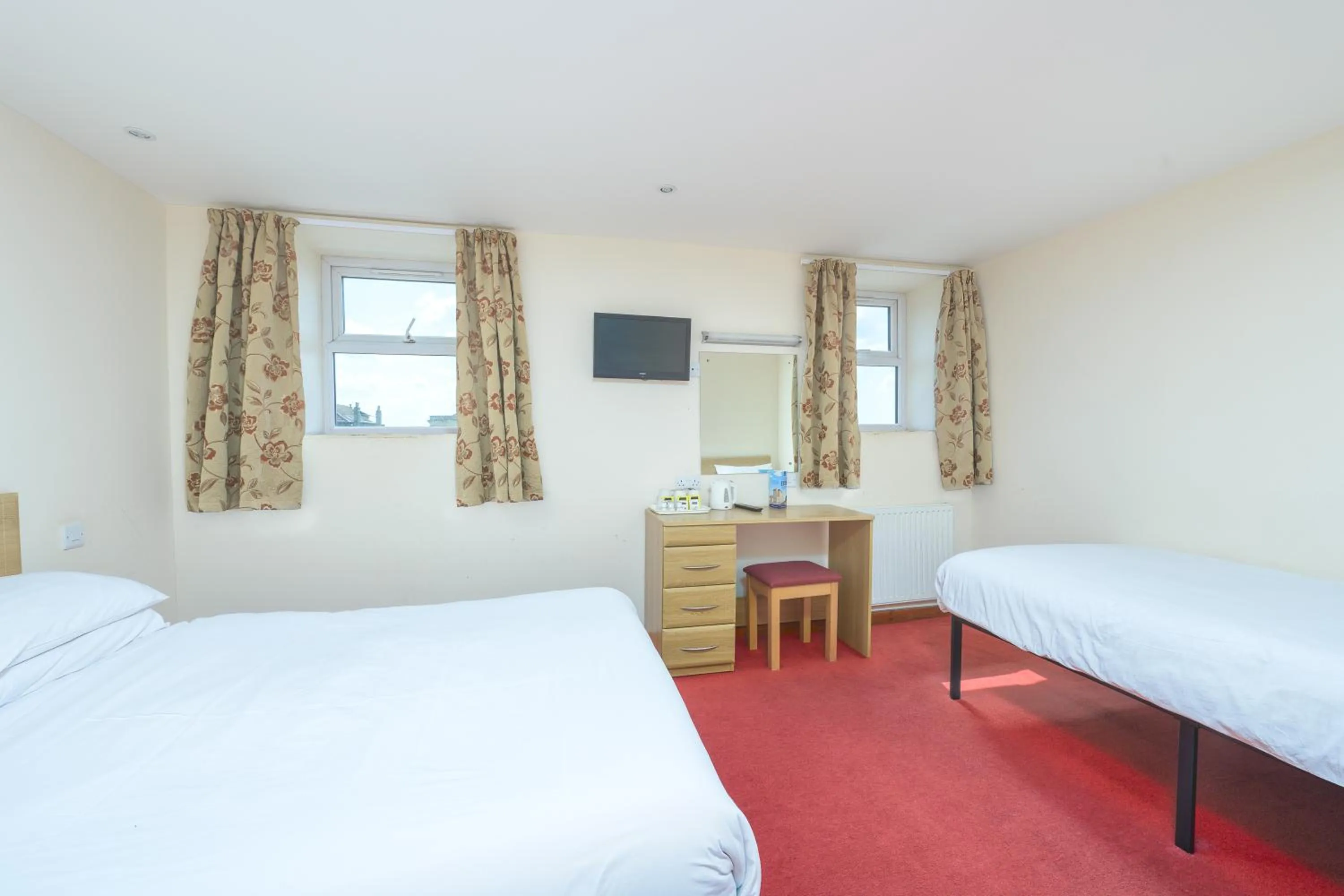 Bed in The Sandringham Hotel