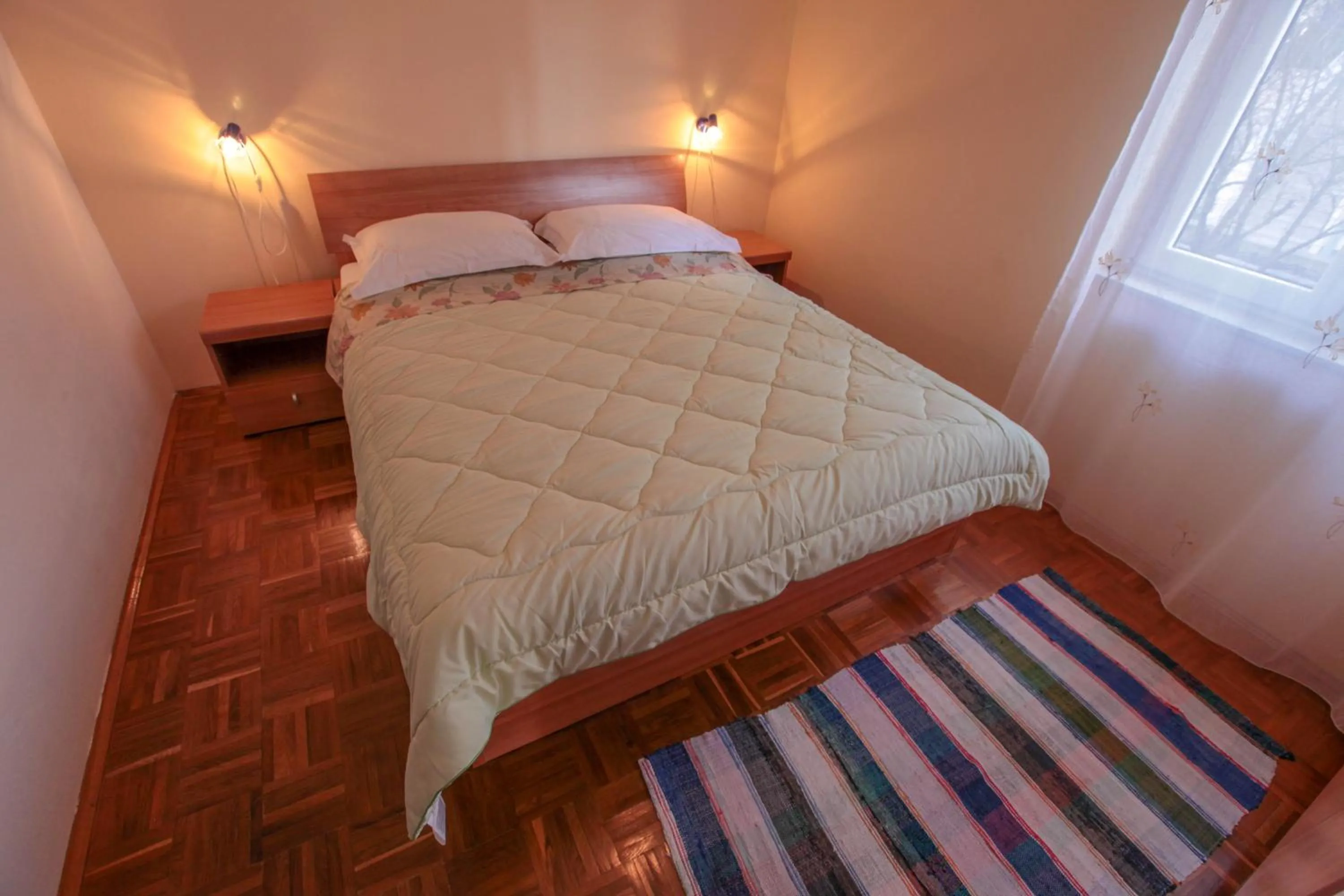 Bed in Apartments Mama