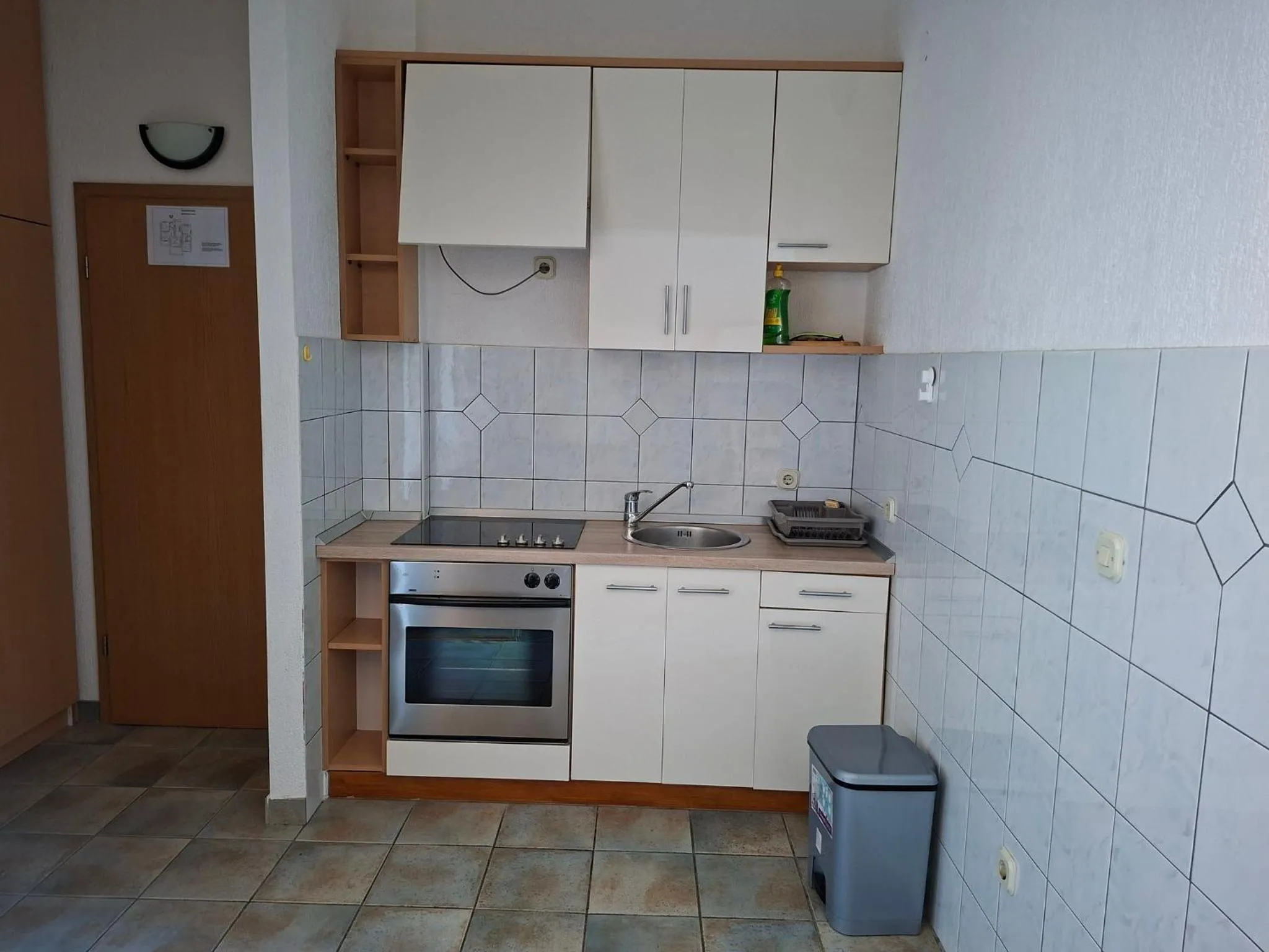 Kitchen or kitchenette in Apartments Mama
