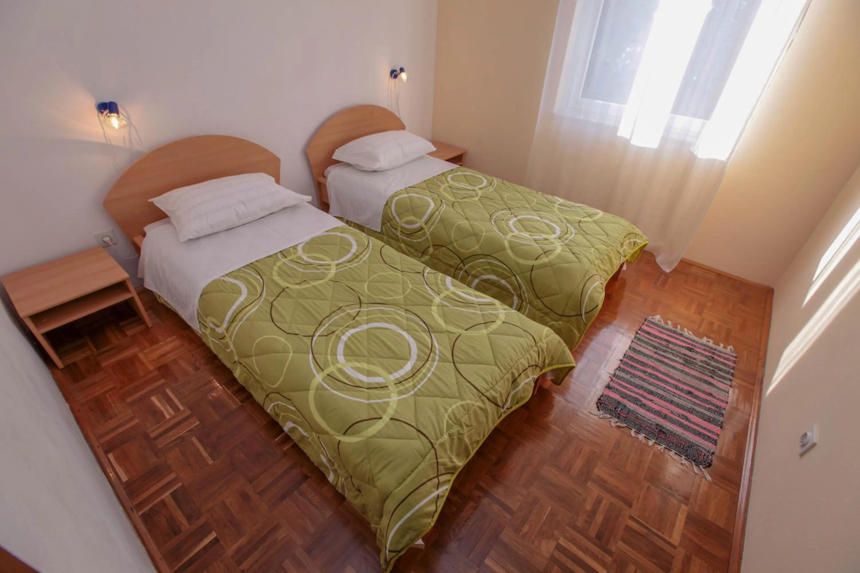 Bed in Apartments Mama