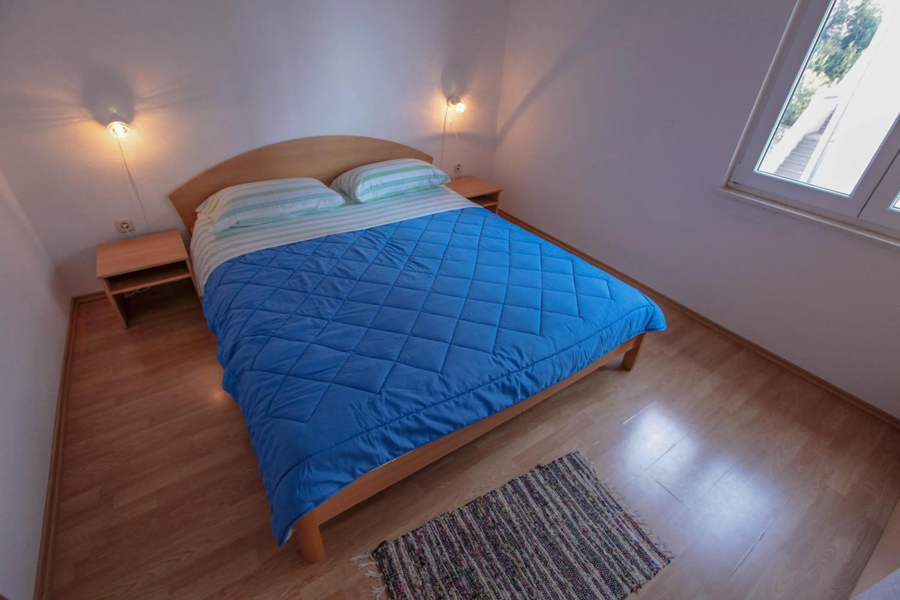 Bed in Apartments Mama