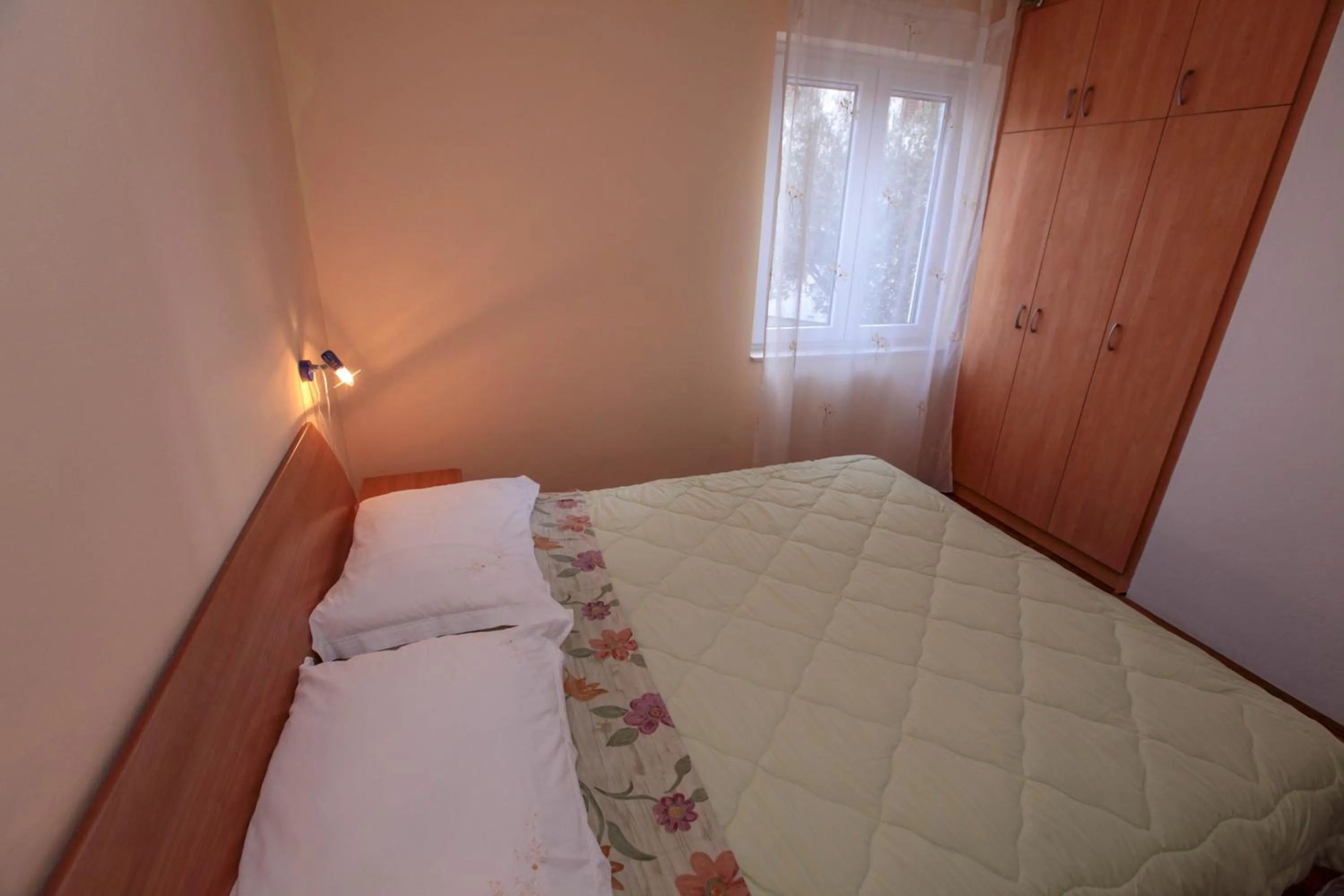 Bed in Apartments Mama
