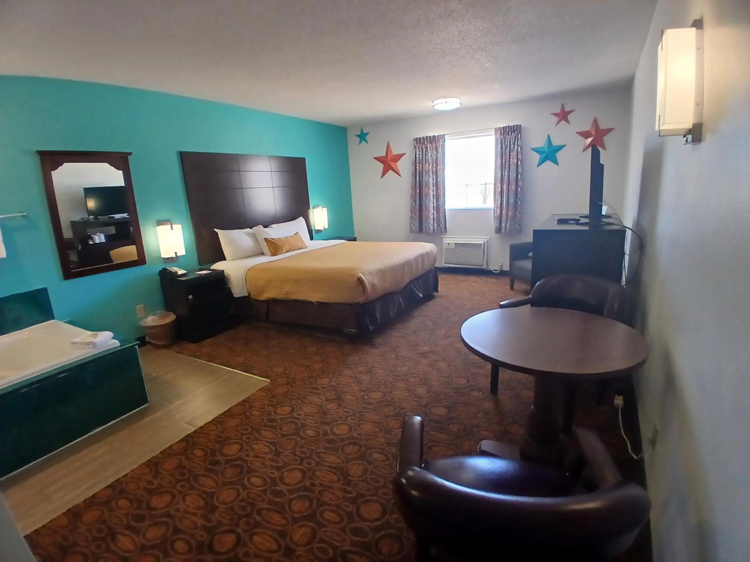 Bed in Howard Johnson by Wyndham Branson Theatre District