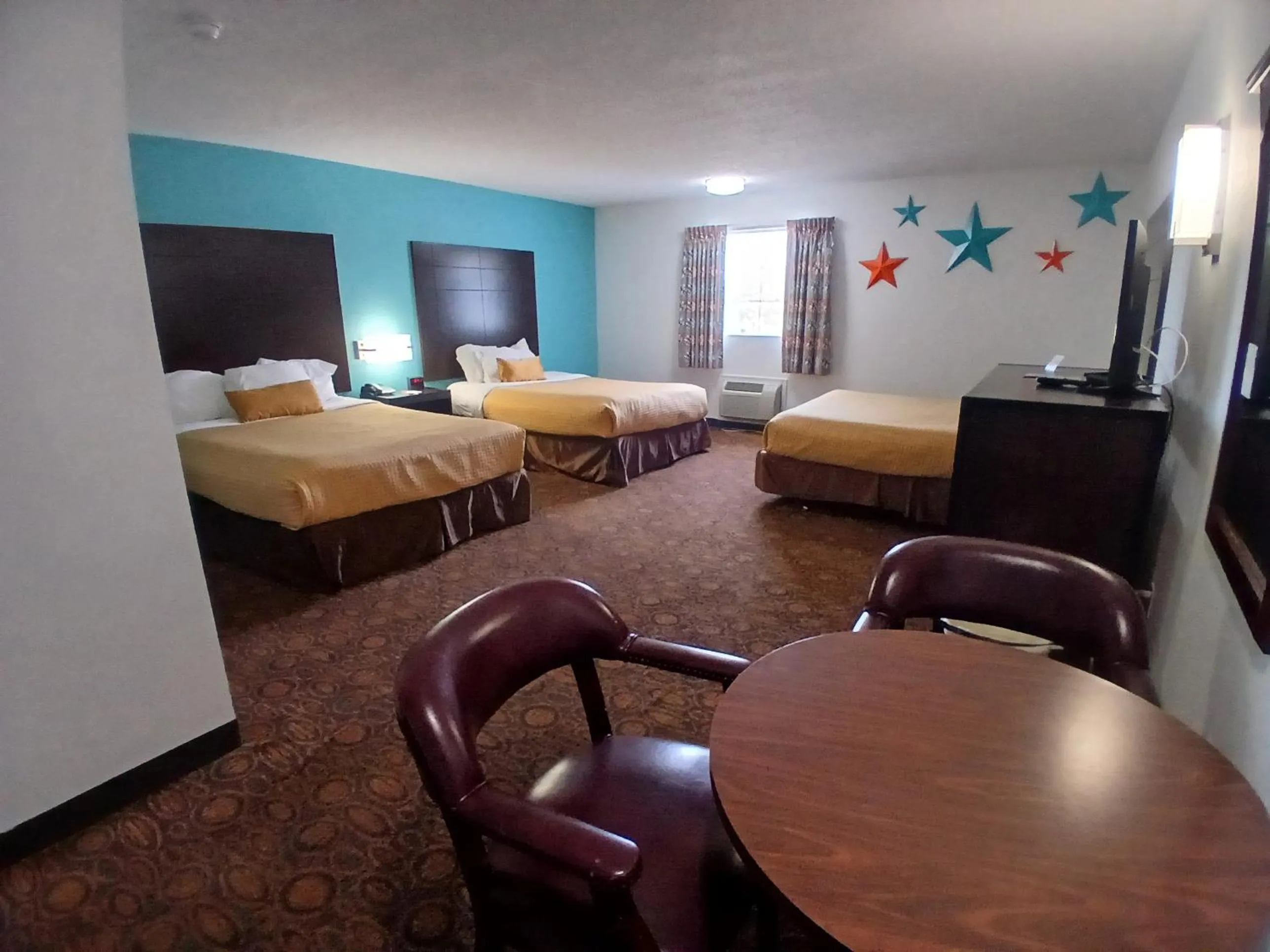 Bed in Howard Johnson by Wyndham Branson Theatre District