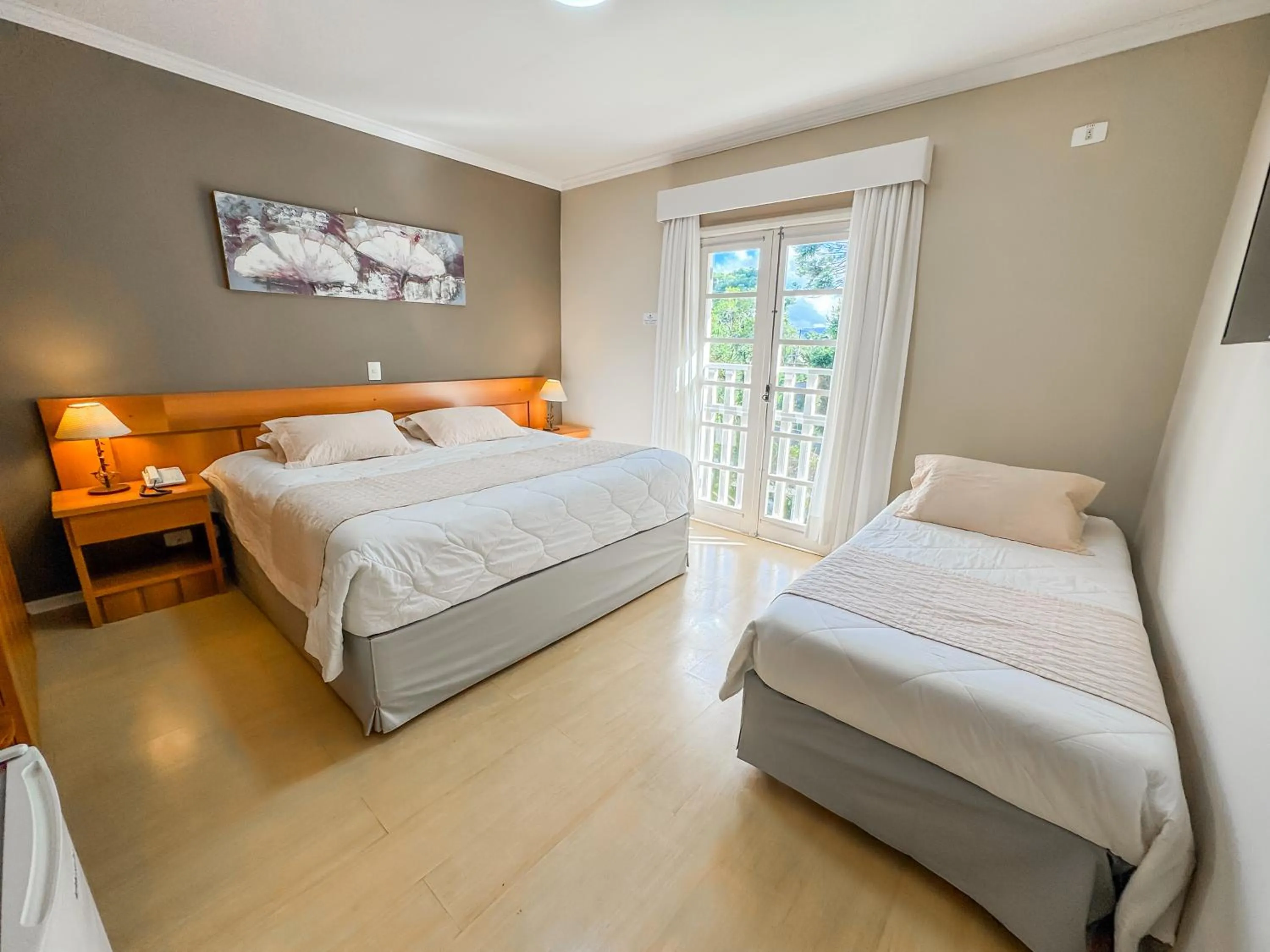 Bed in Pousada Nacional Inn Campos do Jordão